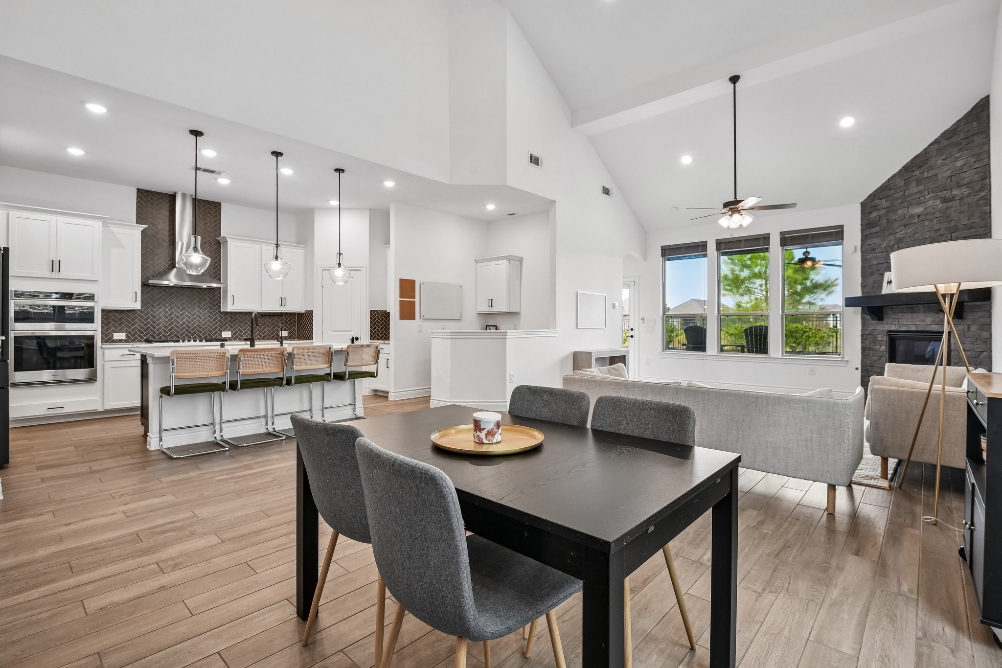 Open kitchen layout connects directly to the dining area and keeps the main level feeling cohesive