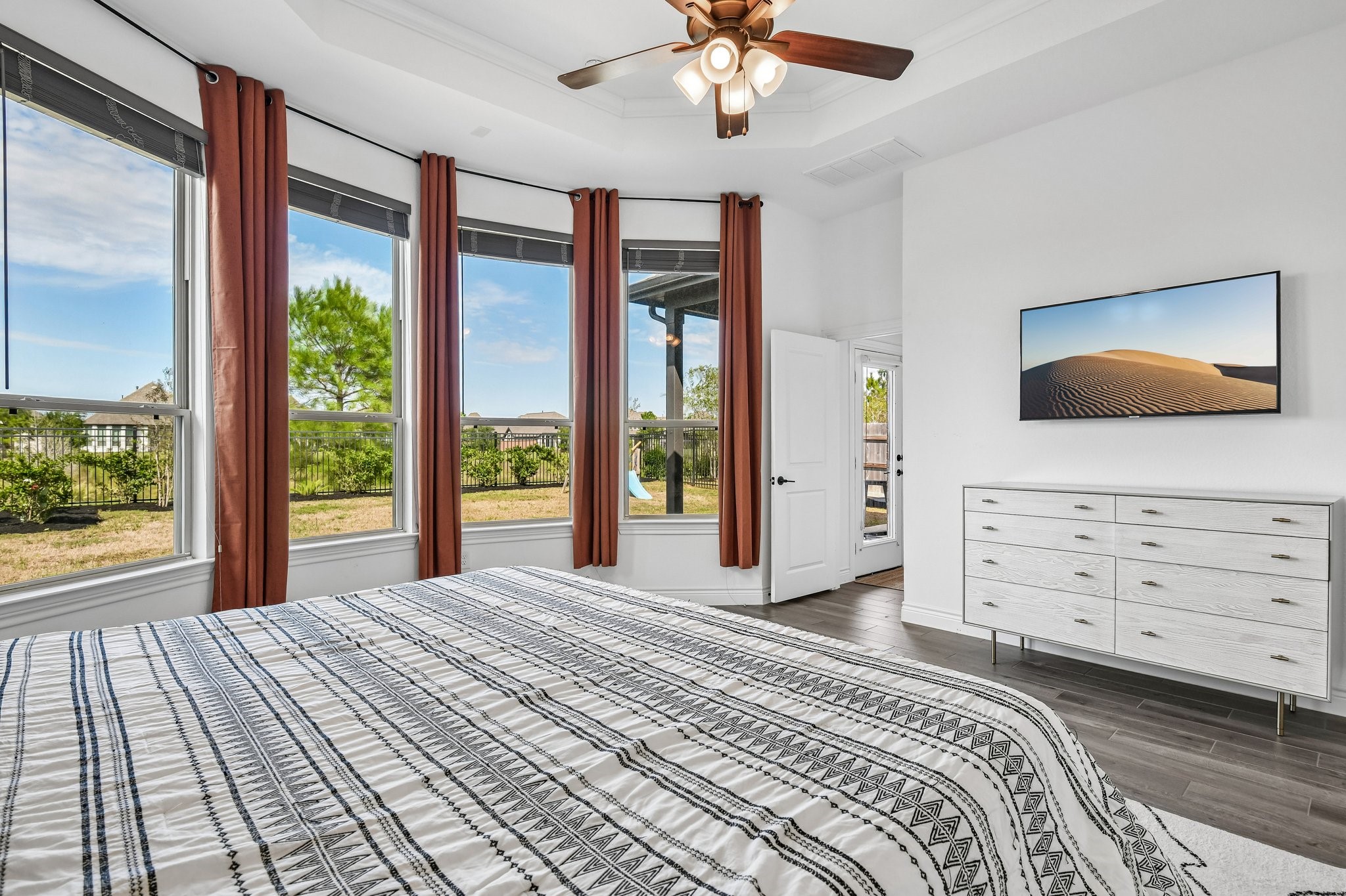 Downstairs primary suite privately positioned away from the secondary bedrooms