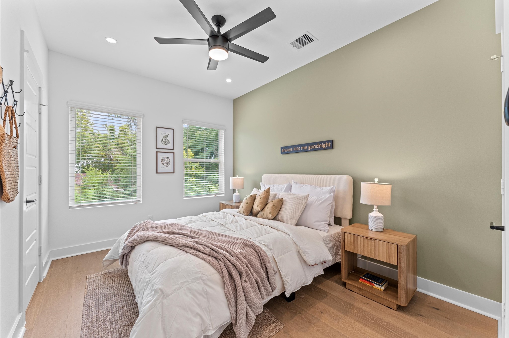 Stylish and versatile secondary bedroom situated on the first floor, offering direct access to the backyard through elegant glass patio door. This sunlit space features generous room for a queen-sized bed and additional furnishings - Ideal for accommodating guests or family members with ease and privacy. Outdoor access enhances the rooms appeal for relaxation, remote work, or multi-generational living. Stylish and versatile secondary bedroom situated on the first floor, offering direct access to the backyard through elegant glass patio door. This sunlit space features generous room for a queen-sized bed and additional furnishings - Ideal for accommodating guests or family members with ease and privacy. Outdoor access enhances the rooms appeal for relaxation, remote work, or multi-generational living.