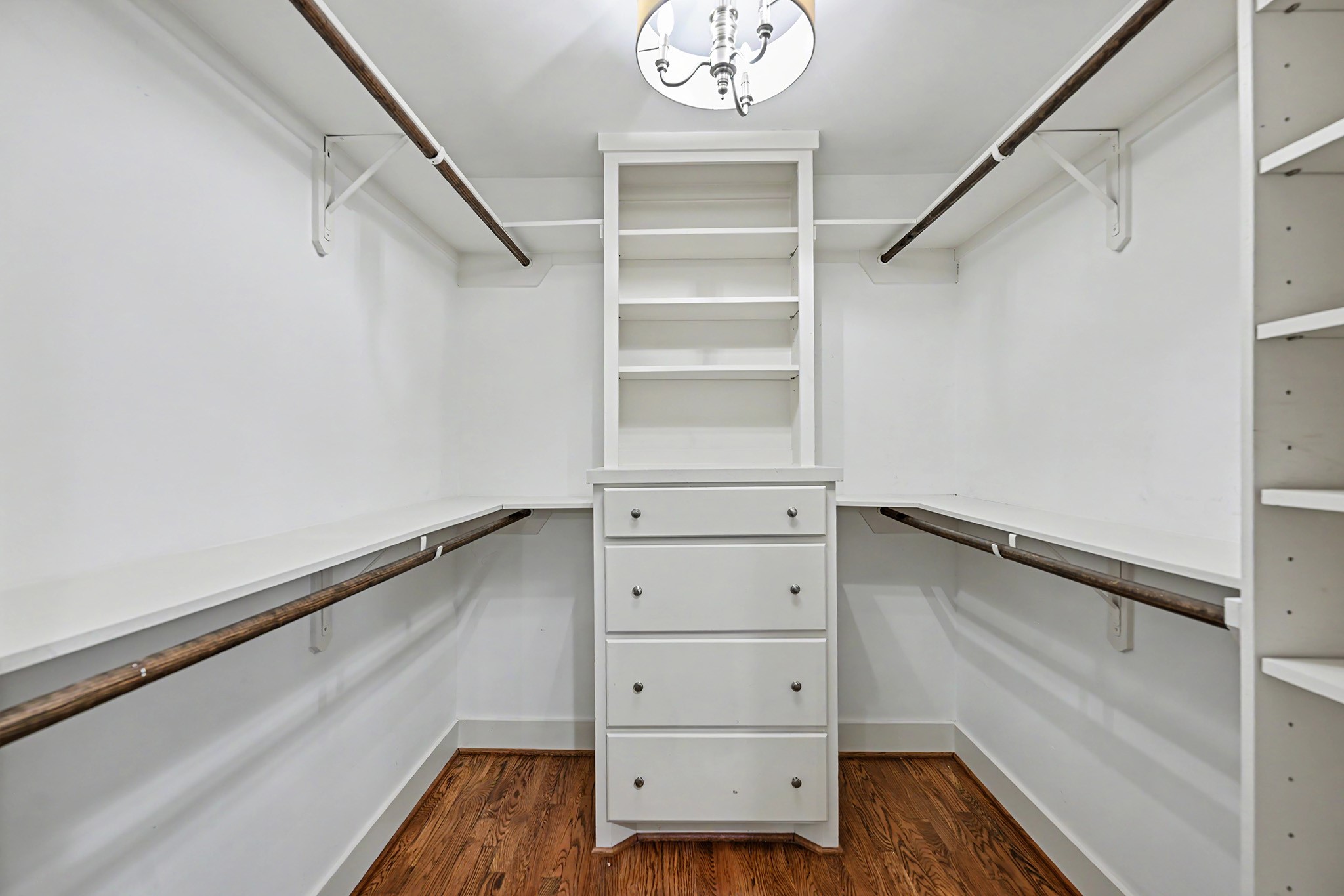 A second walk-in closet in the primary suite provides additional storage and organization.