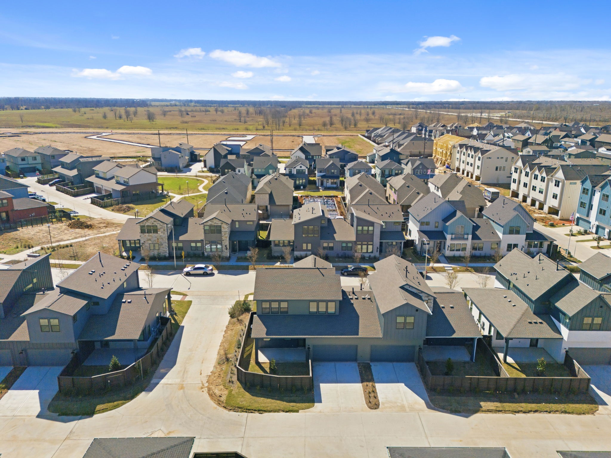 From the back, this home continues to impress with a private, thoughtfully designed layout and a spacious 2-car garage. The surrounding Indigo community creates a welcoming setting where you can enjoy the neighborhood while still having a place that feels like your own.