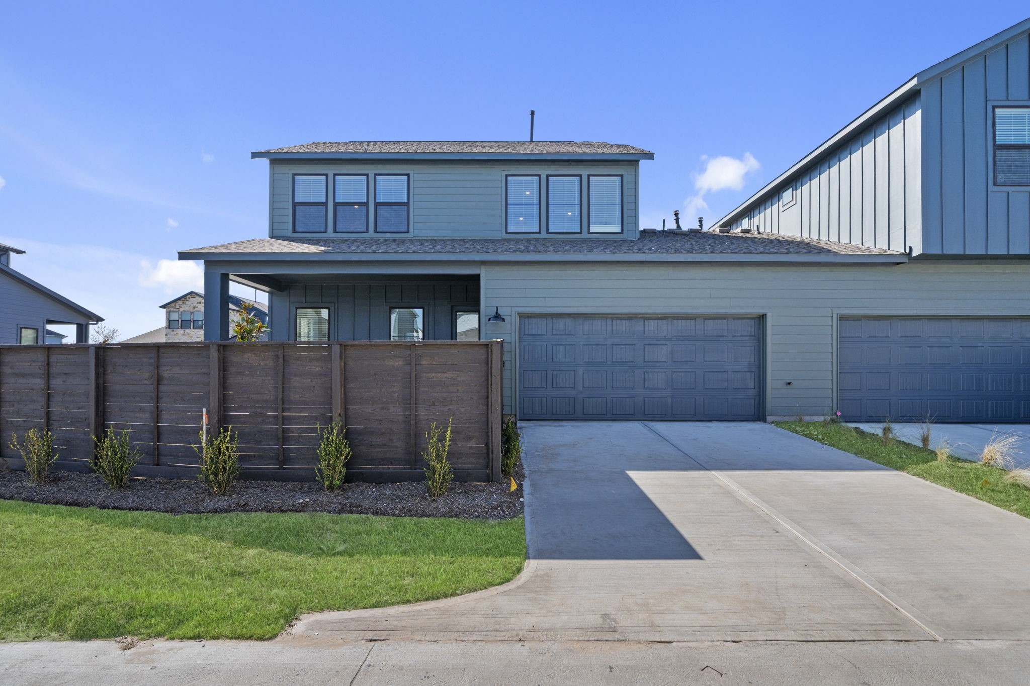 Enjoy the convenience of your own two-car attached garage, complemented by a spacious driveway with plenty of room for parking. The thoughtfully landscaped front yard and private fencing add a welcoming touch while giving the home its own sense of space.