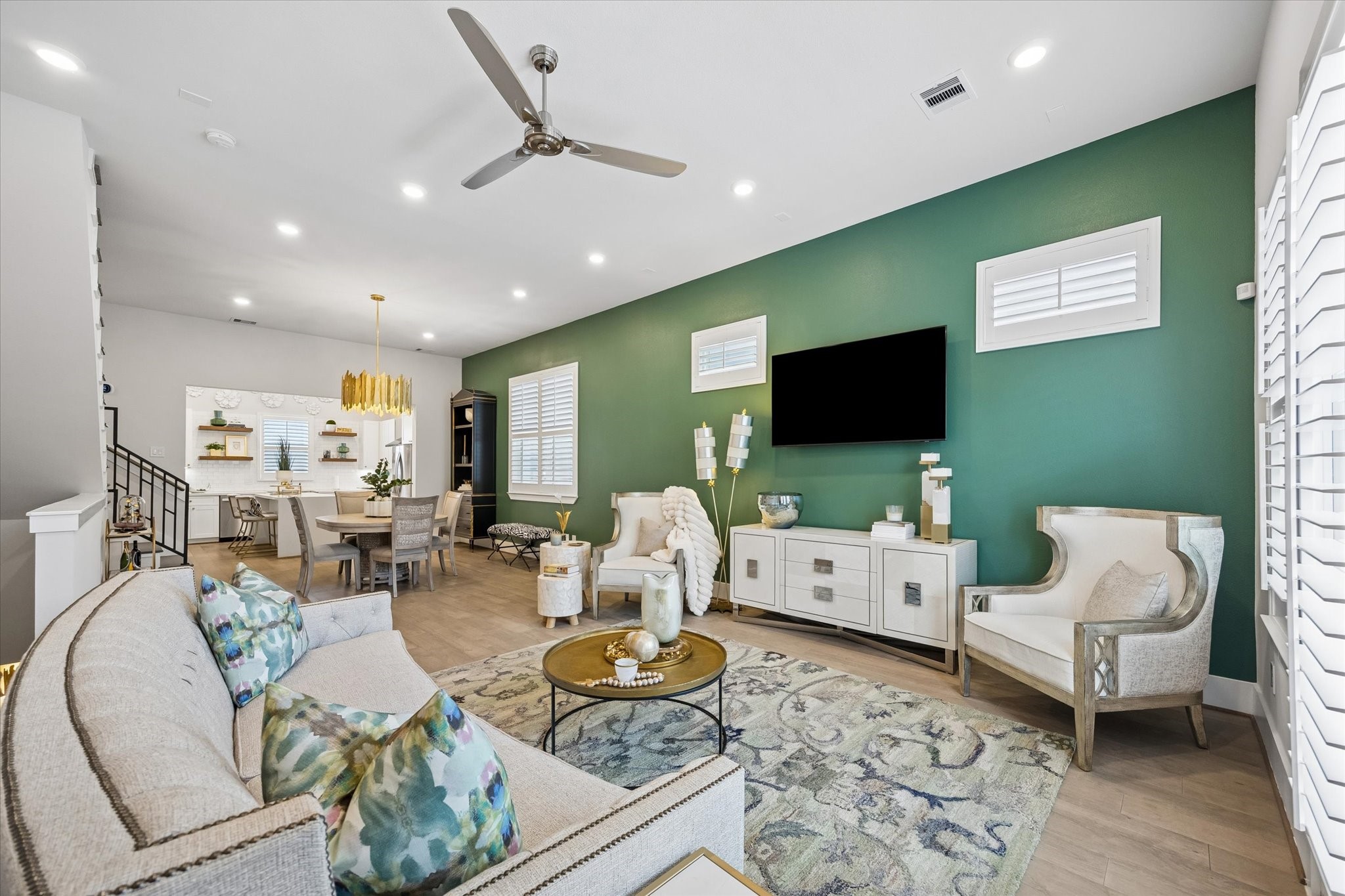 From quiet evenings in, to lively gatherings with friends, this open living area is ready for it all with 10' ceilings, warm engineered wood flooring, designer paint, and balcony access for a little fresh air.