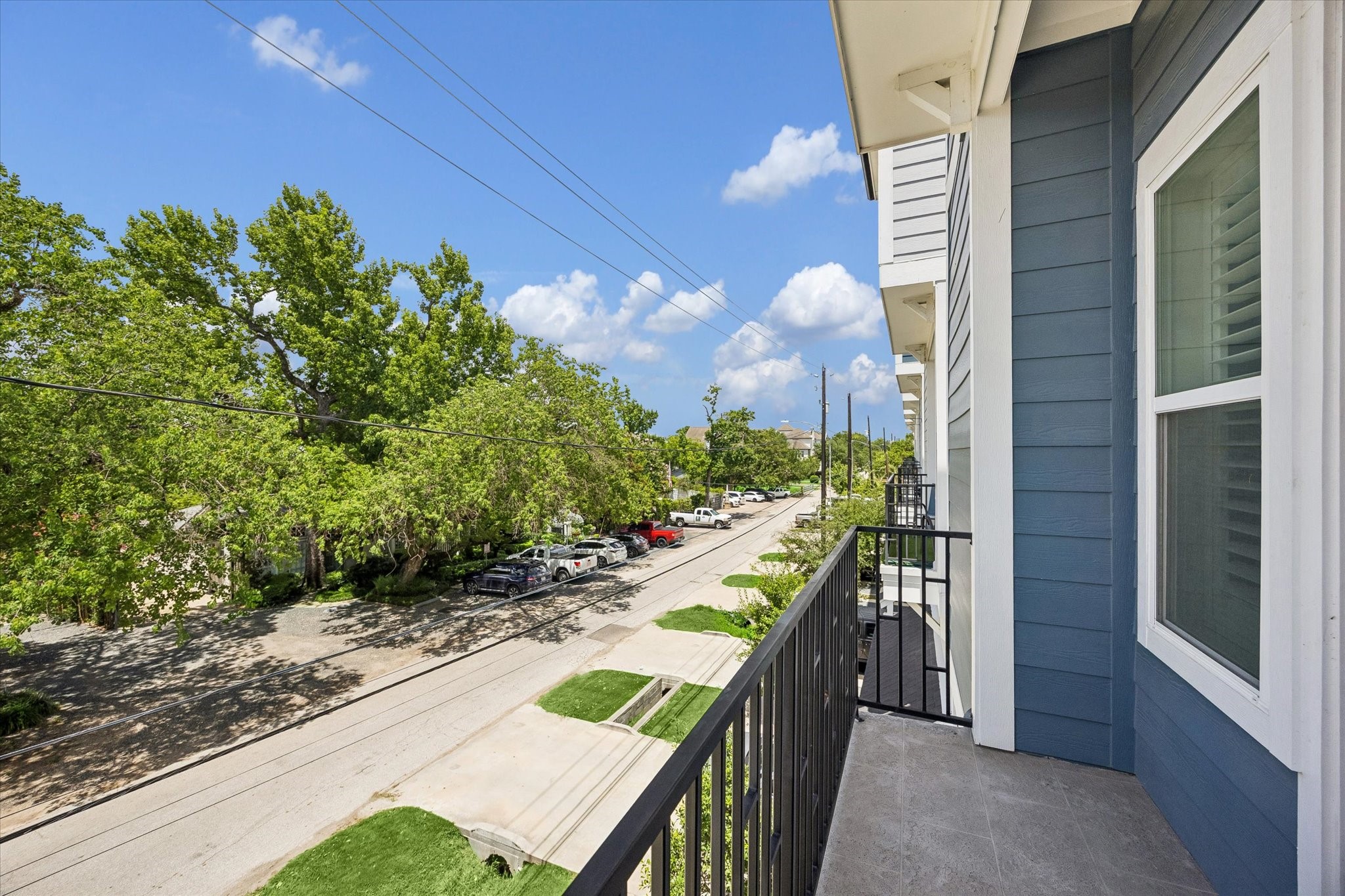 The balcony off the living area gives you another spot to step outside, enjoy fresh air, and take in the energy of the surrounding neighborhood.