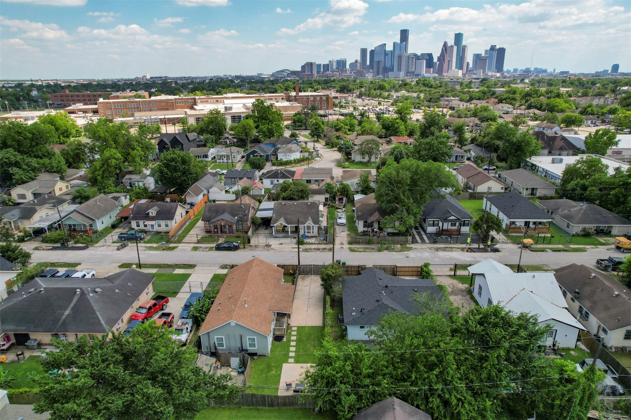 Aerial view with full Downtown Houston skyline visible, highlighting the property's exceptional inner-loop location just minutes from the city center.