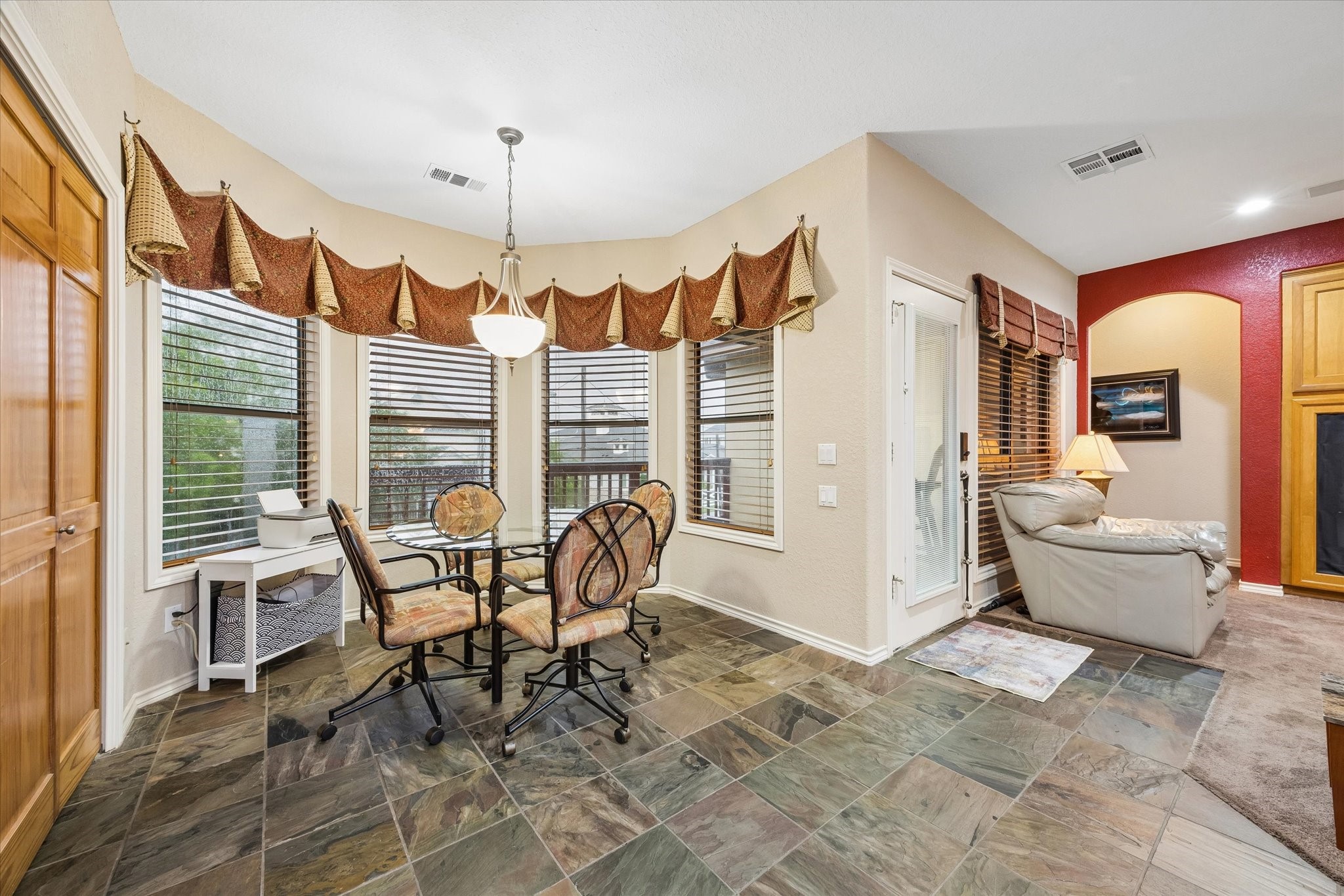 Breakfast area with bay windows and abundant of natural light, offering views of the backyard and access to the upper deck. Located off the kitchen and main living space. Breakfast area with bay windows and abundant of natural light, offering views of the backyard and access to the upper deck. Located off the kitchen and main living space.