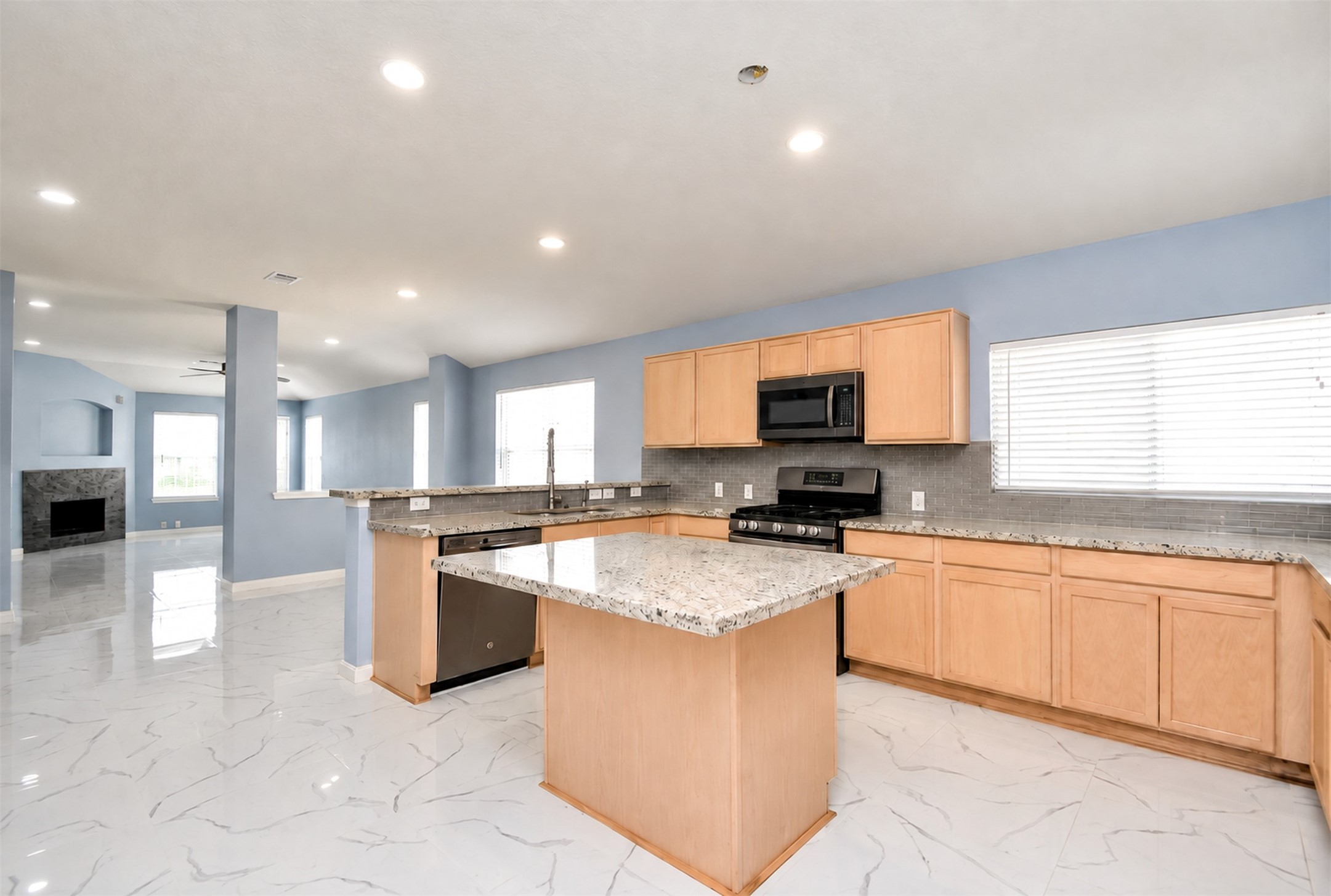 Kitchen Area
***Property is vacant. Photo digitally enhanced with AI; lighting, color, and ceiling appearance adjusted. ***