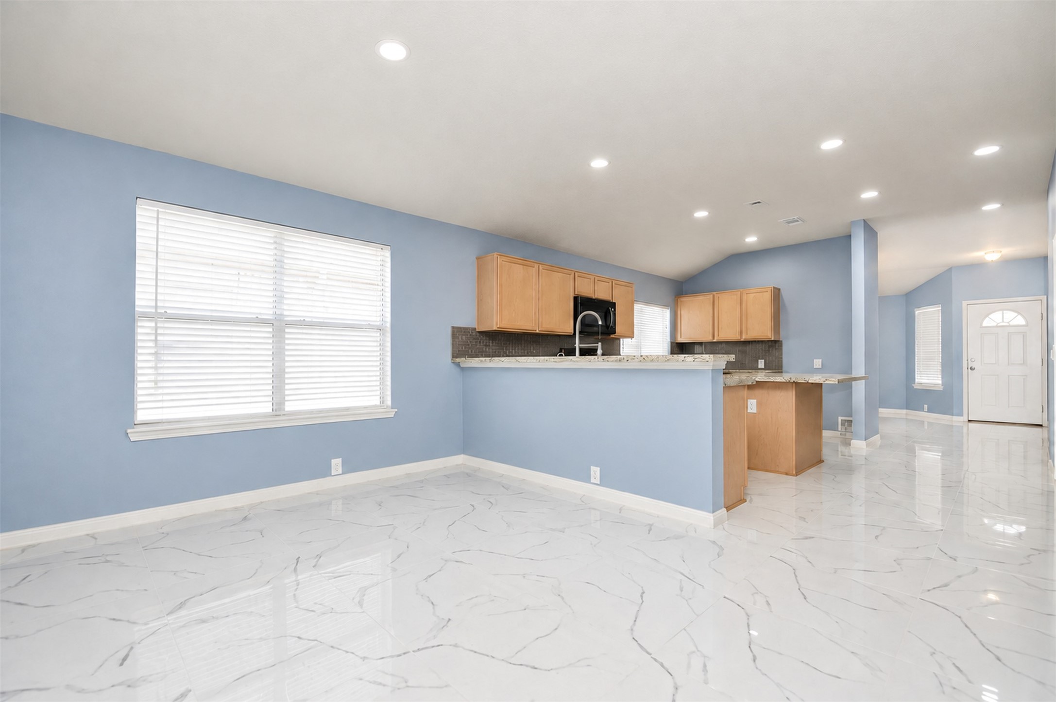Kitchen Area/Extra Room
***Property is vacant. Photo digitally enhanced with AI; lighting, color, and ceiling appearance adjusted. ***