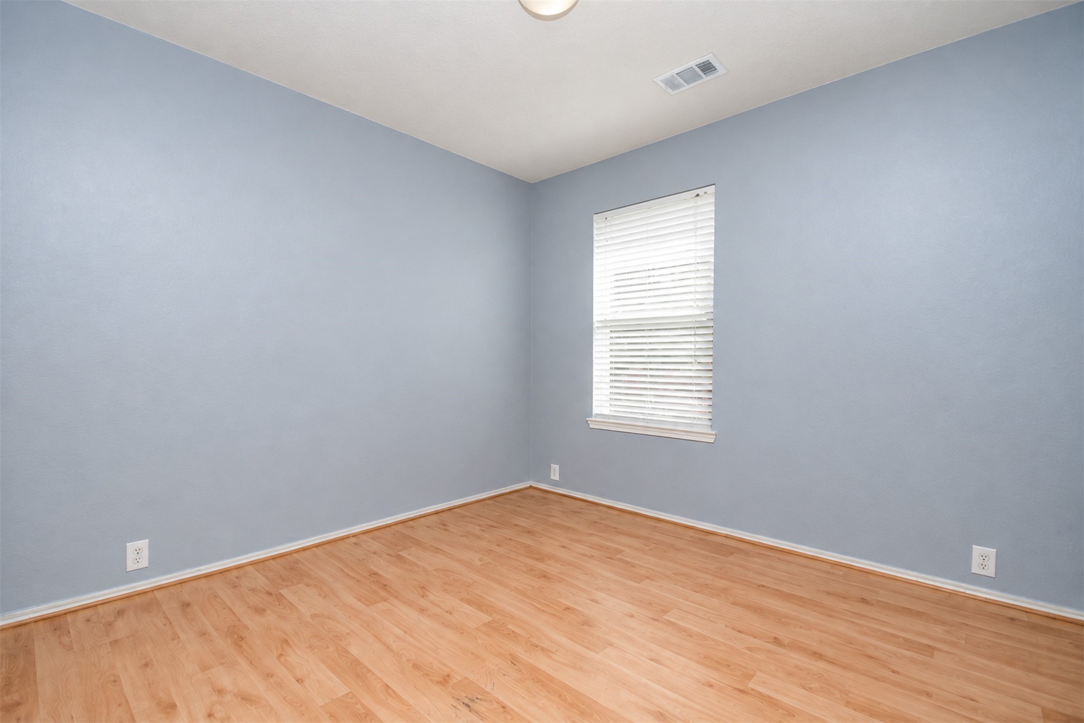 3rdd Bedroom
***Property is vacant. Photo digitally enhanced with AI; lighting, color, and ceiling appearance adjusted. ***