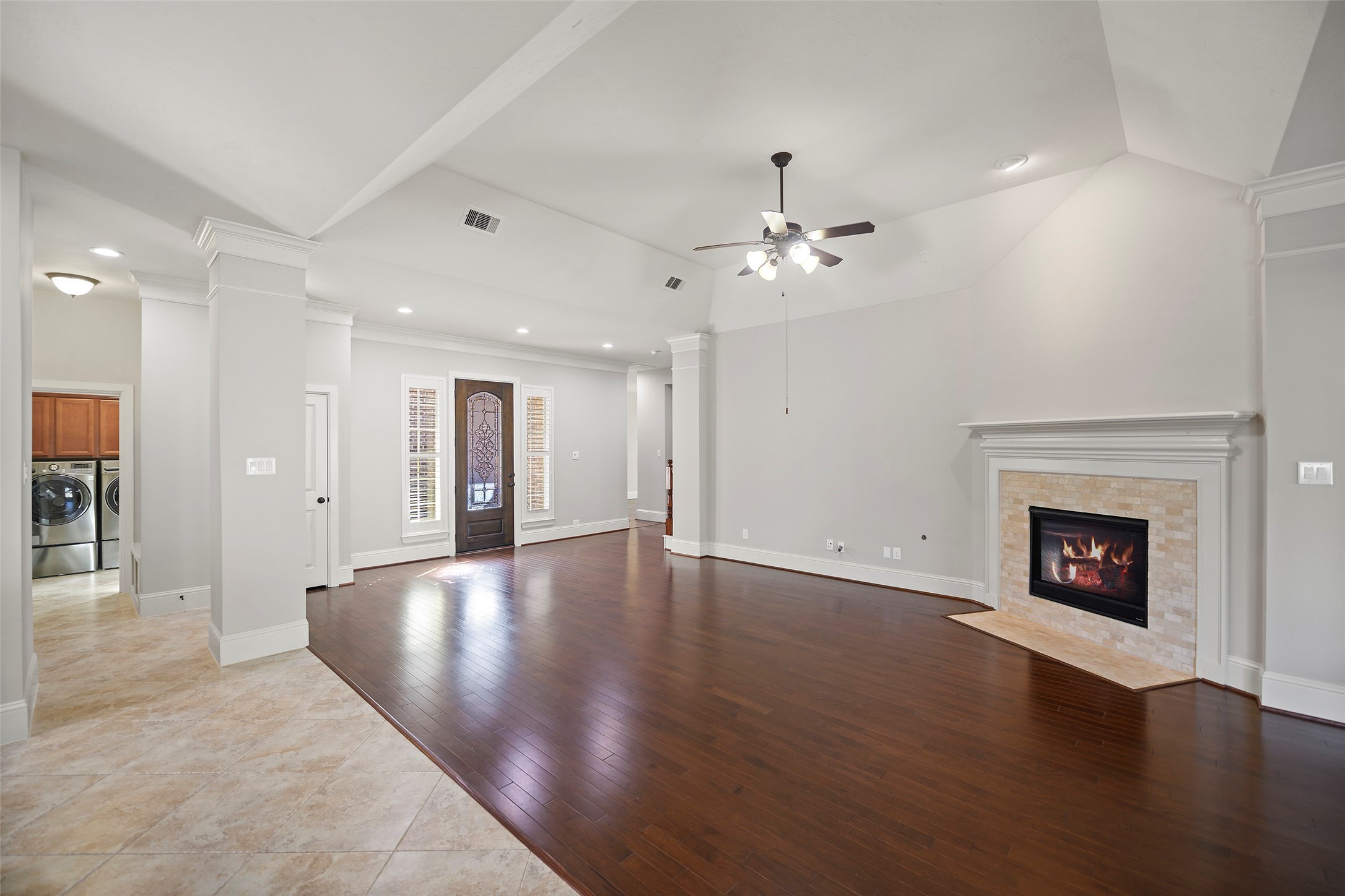 The spacious open air kitchen and family room are perfect for entertaining.