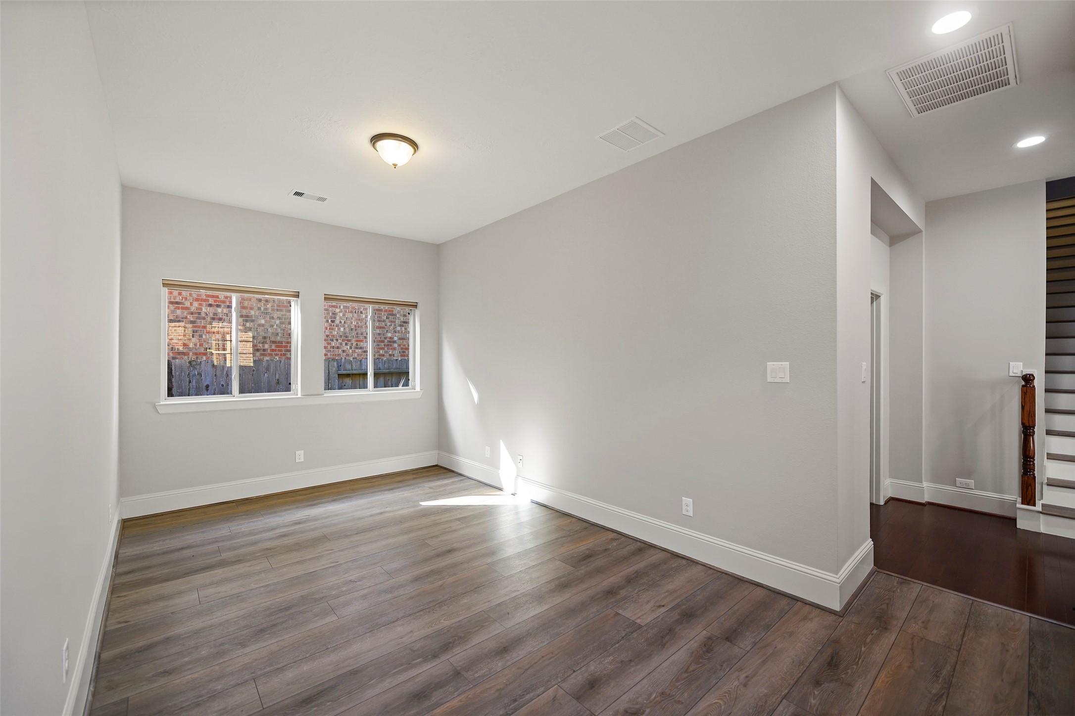 Staircase off of the bonus room leads to the upstairs game/media room.