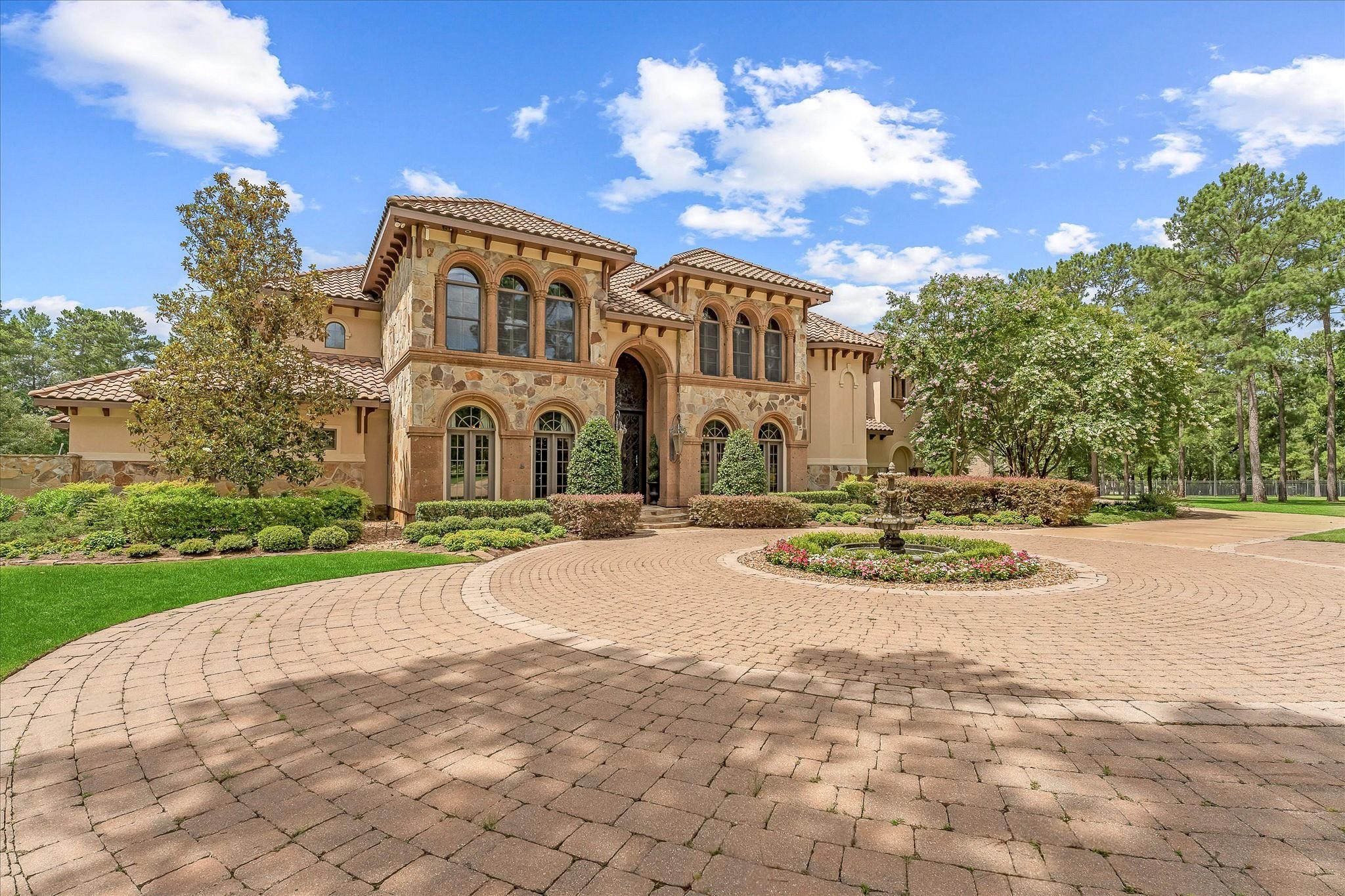 Masterfully designed Mediterranean-style custom home features handcrafted finishes throughout. Situated on the green of Hole #1 at High Meadow Ranch Golf Course on just over 4 fully fenced & landscaped acres.