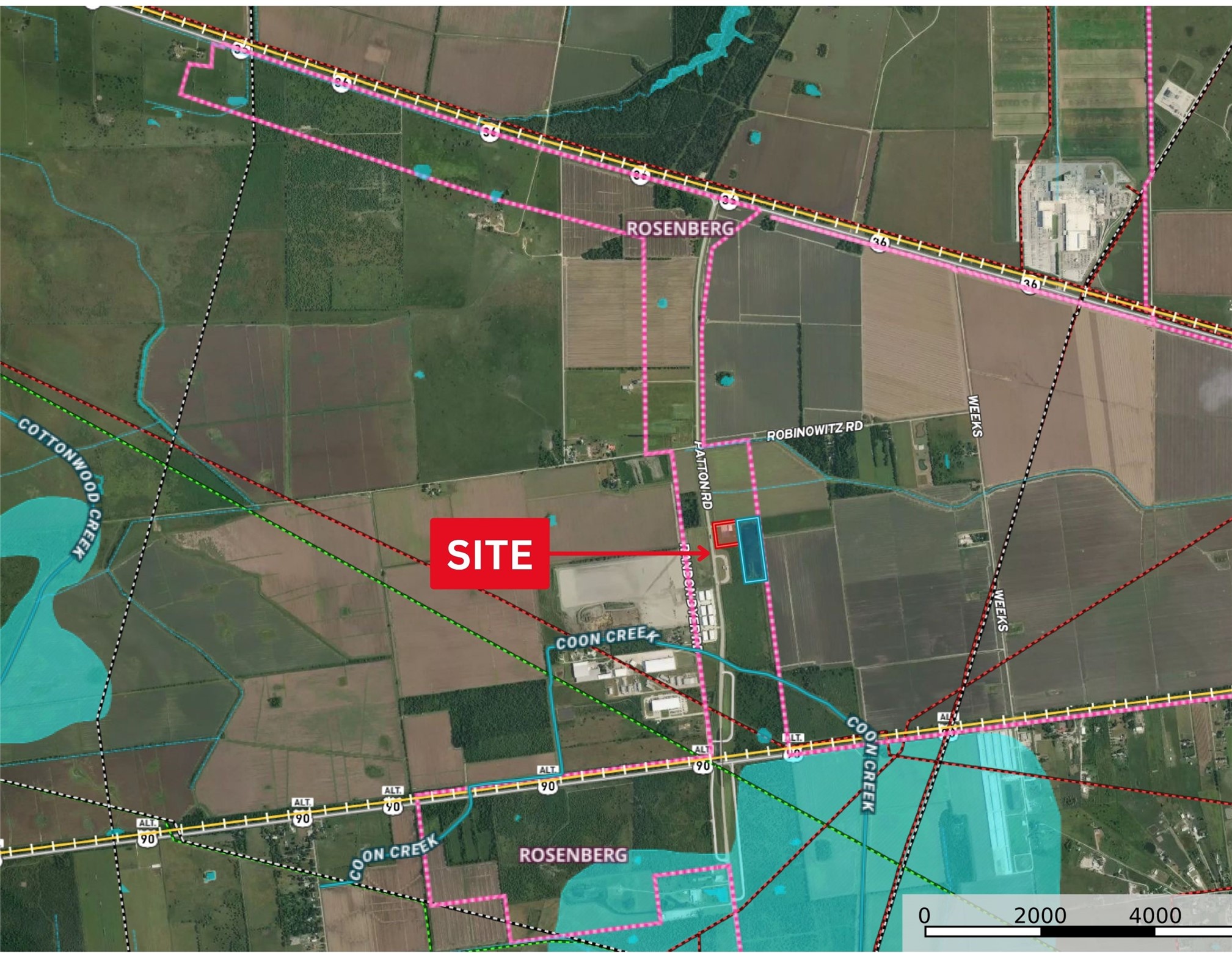 Map showing floodzone, city limits, pipelines, railroad tracks, surface water, transmission lines