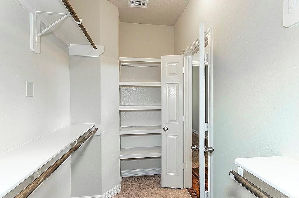 This picture is not updated to show the new vinyl plank flooring, but closet is same.