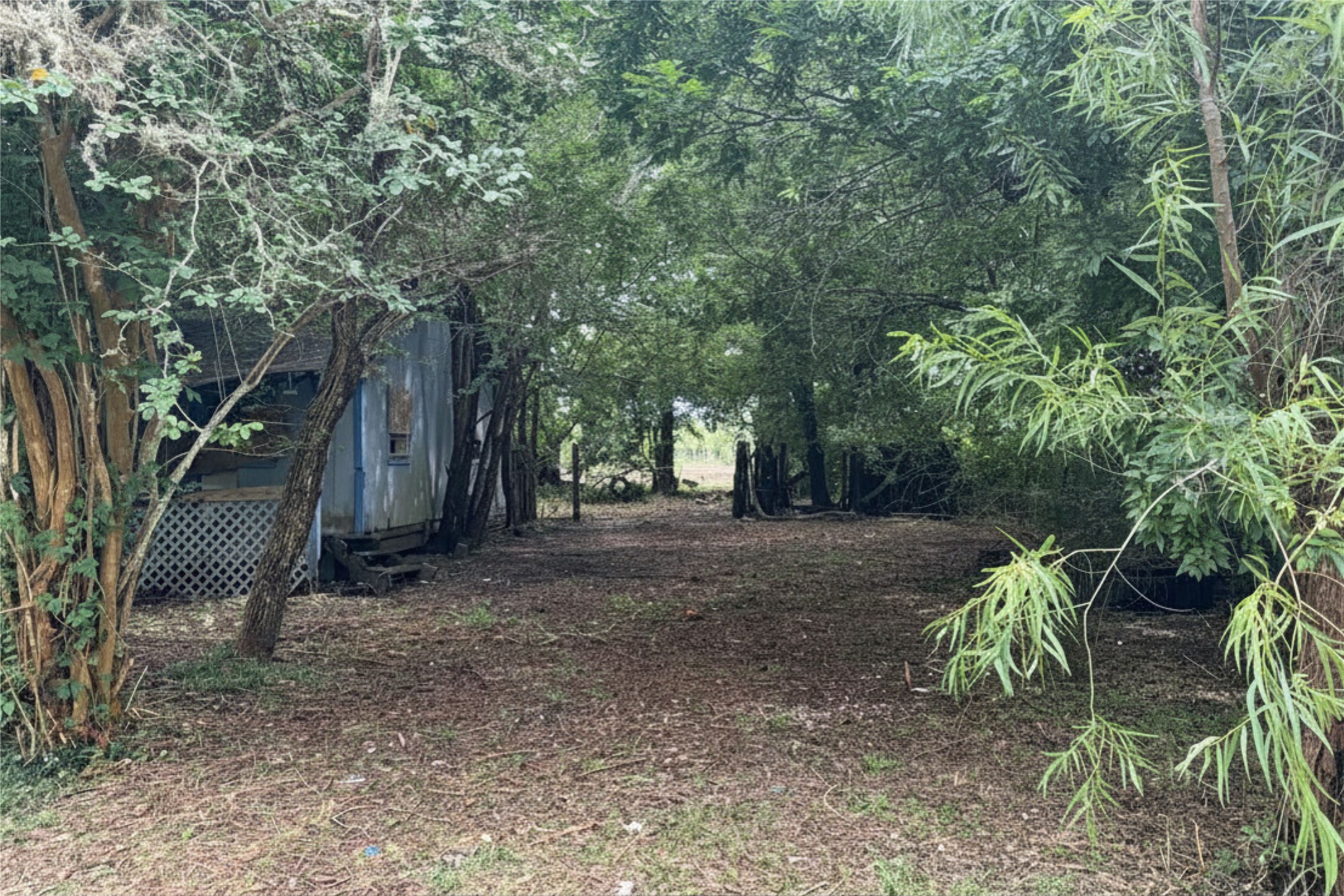 This AS-IS property is bursting with possibilities for redevelopment, expansion, or the creation of a serene private retreat.