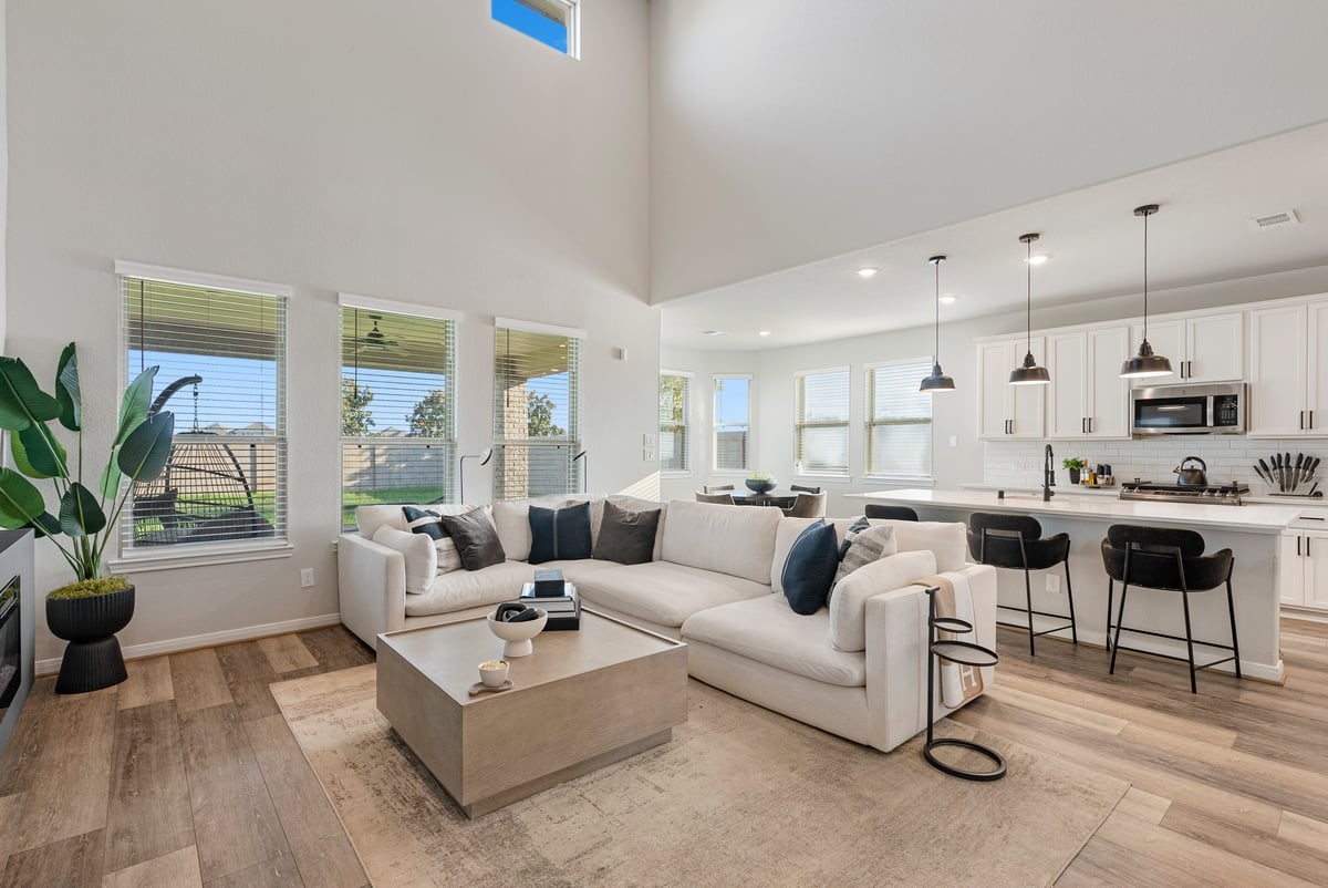 This open and airy home has a sleek contemporary design! Graceful wood flooring flows throughout the first floor living areas! This open and airy home has a sleek contemporary design! Graceful wood flooring flows throughout the first floor living areas!