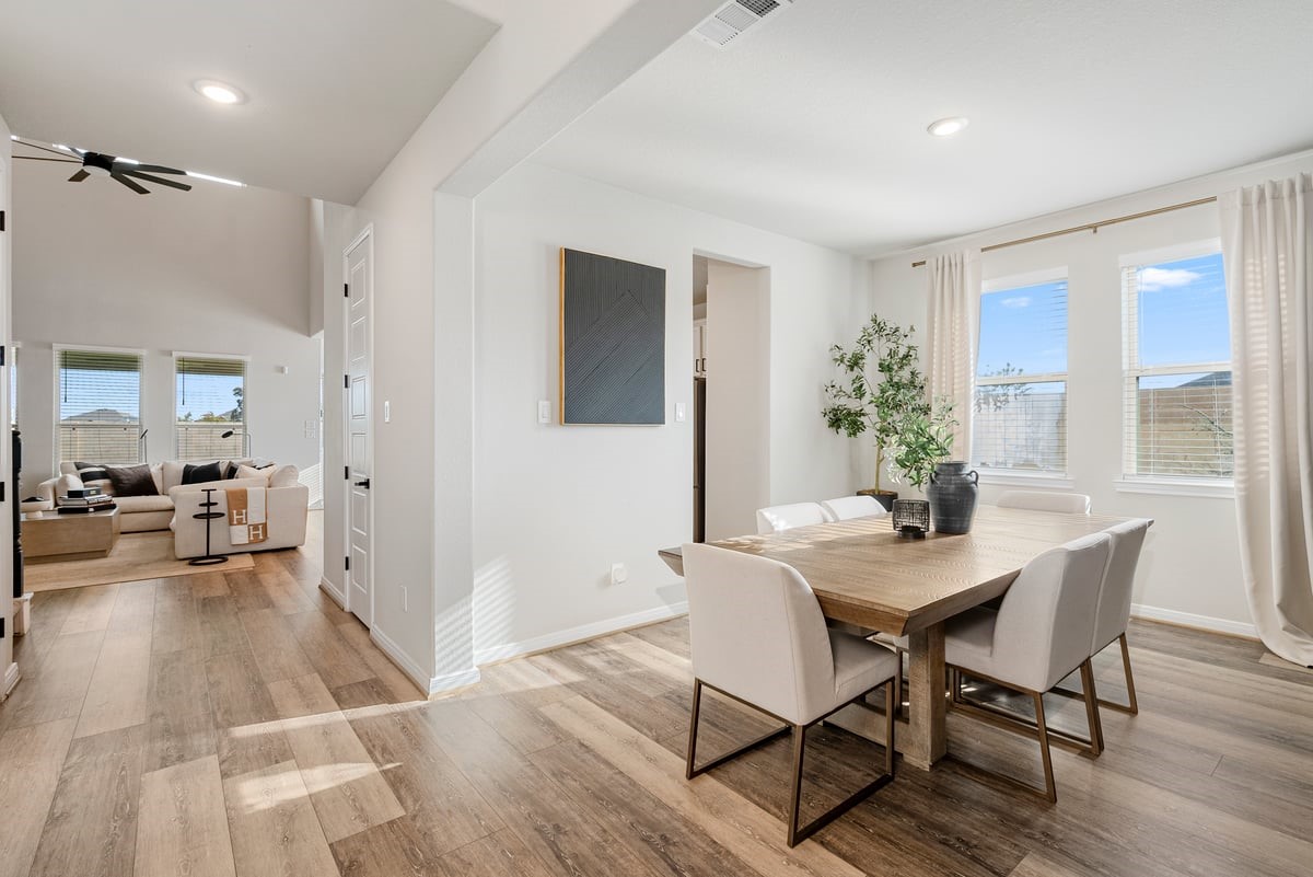 Upgraded wood flooring invites you into the living room and kitchen!