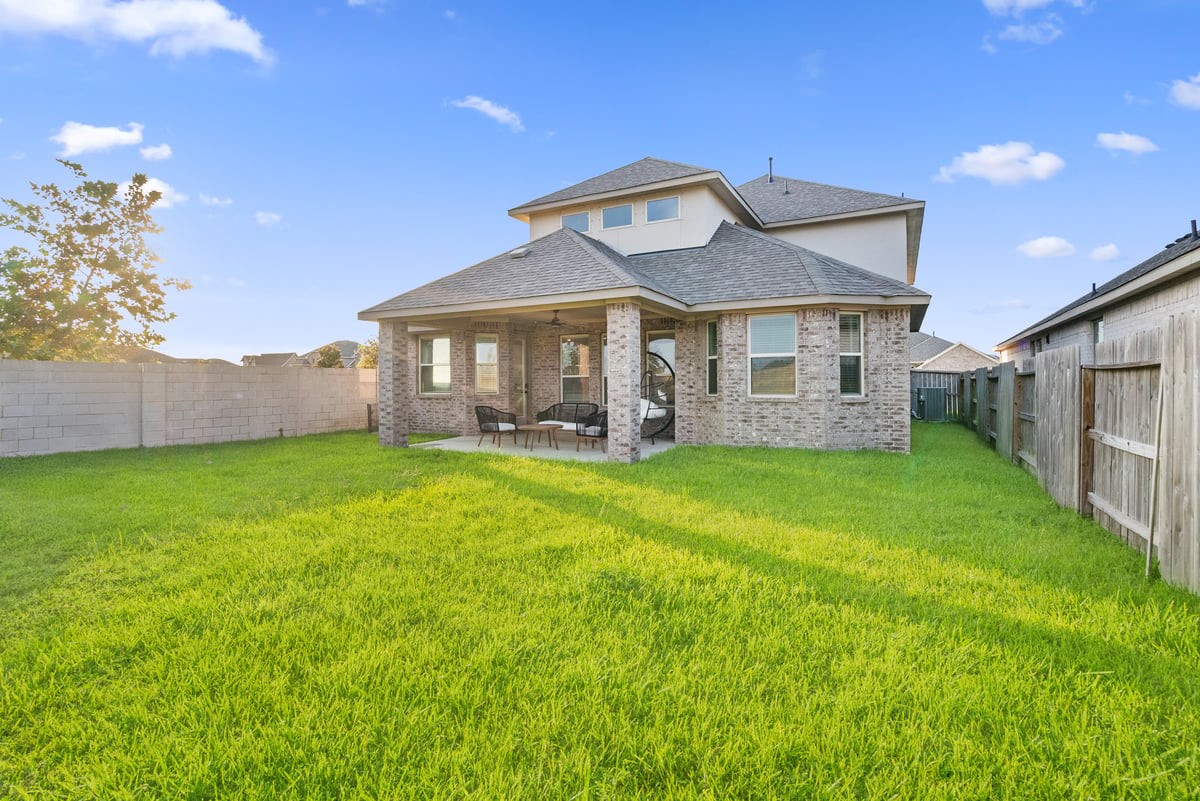 This yard is ready for outdoor fun! Imagine fun games with friends, or a relaxing day in your garden!