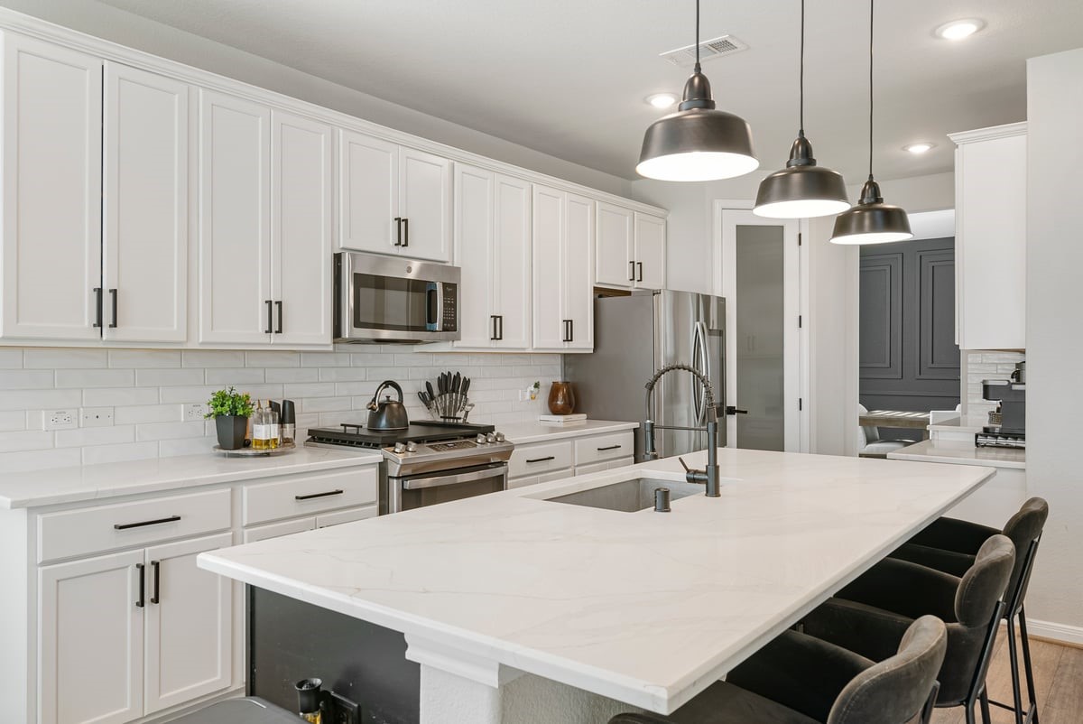 Imagine gathering with friends around this expansive kitchen island! Enjoy plenty of storage space with an abundance of cabinetry!