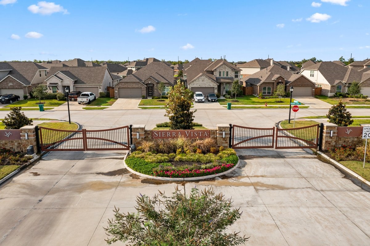 This home is conveniently located in the gated section of the community