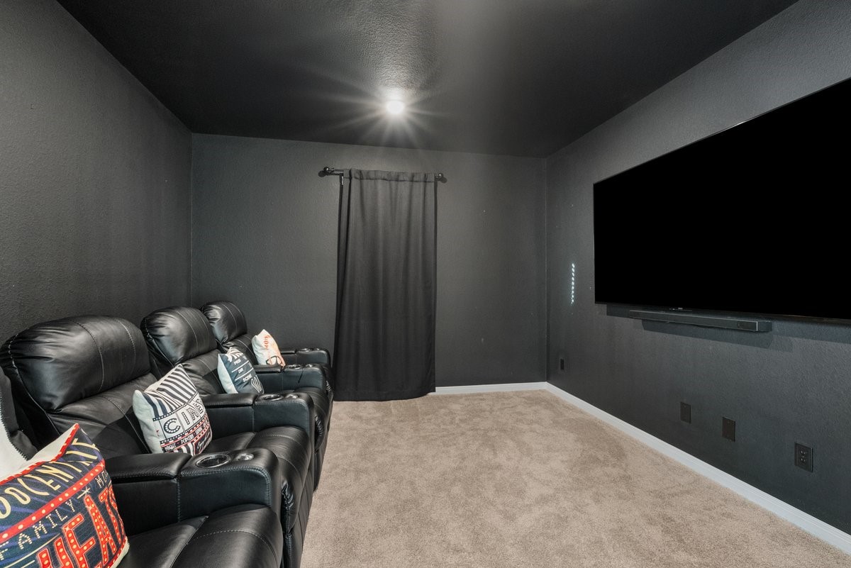 Movie nights and game days are a blast in this dedicated media room!