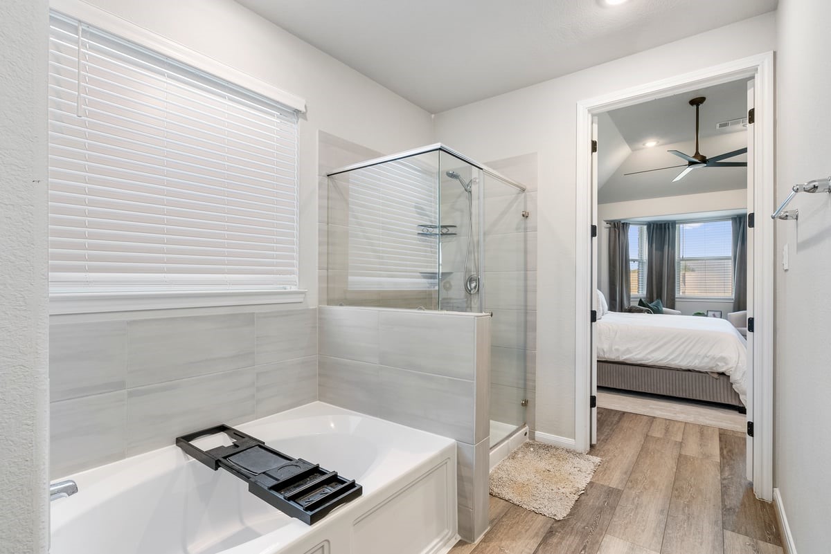 Enjoy a relaxing bubble bath, or a quick shower! This bathroom offers the luxury of both options!