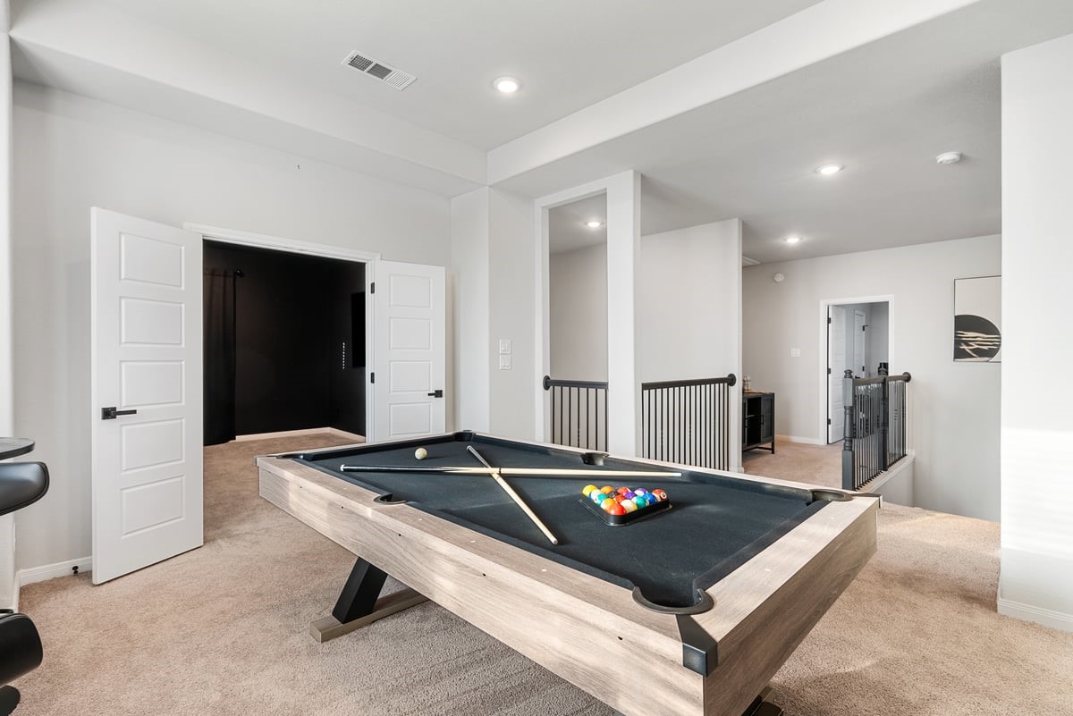 Contain the fun upstairs in the spacious game room!