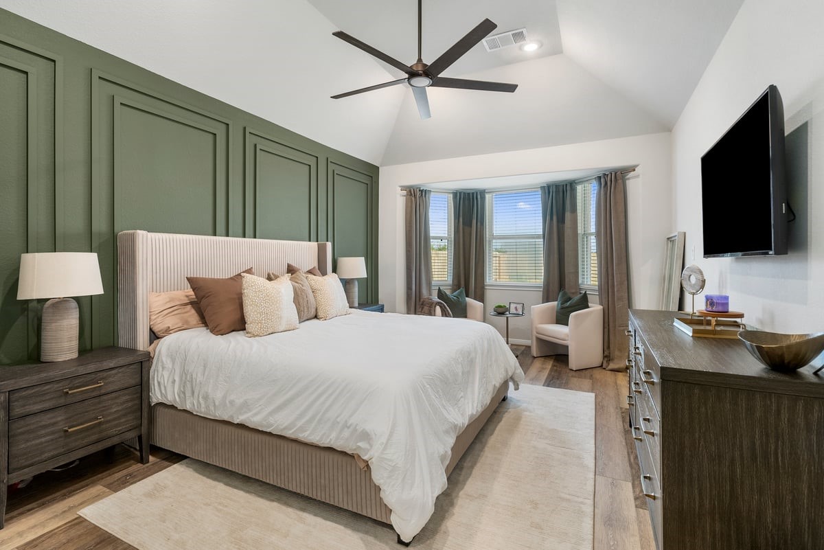 Wake up feeling refreshed in this spacious primary suite! The extended sitting area features a charming bay window!