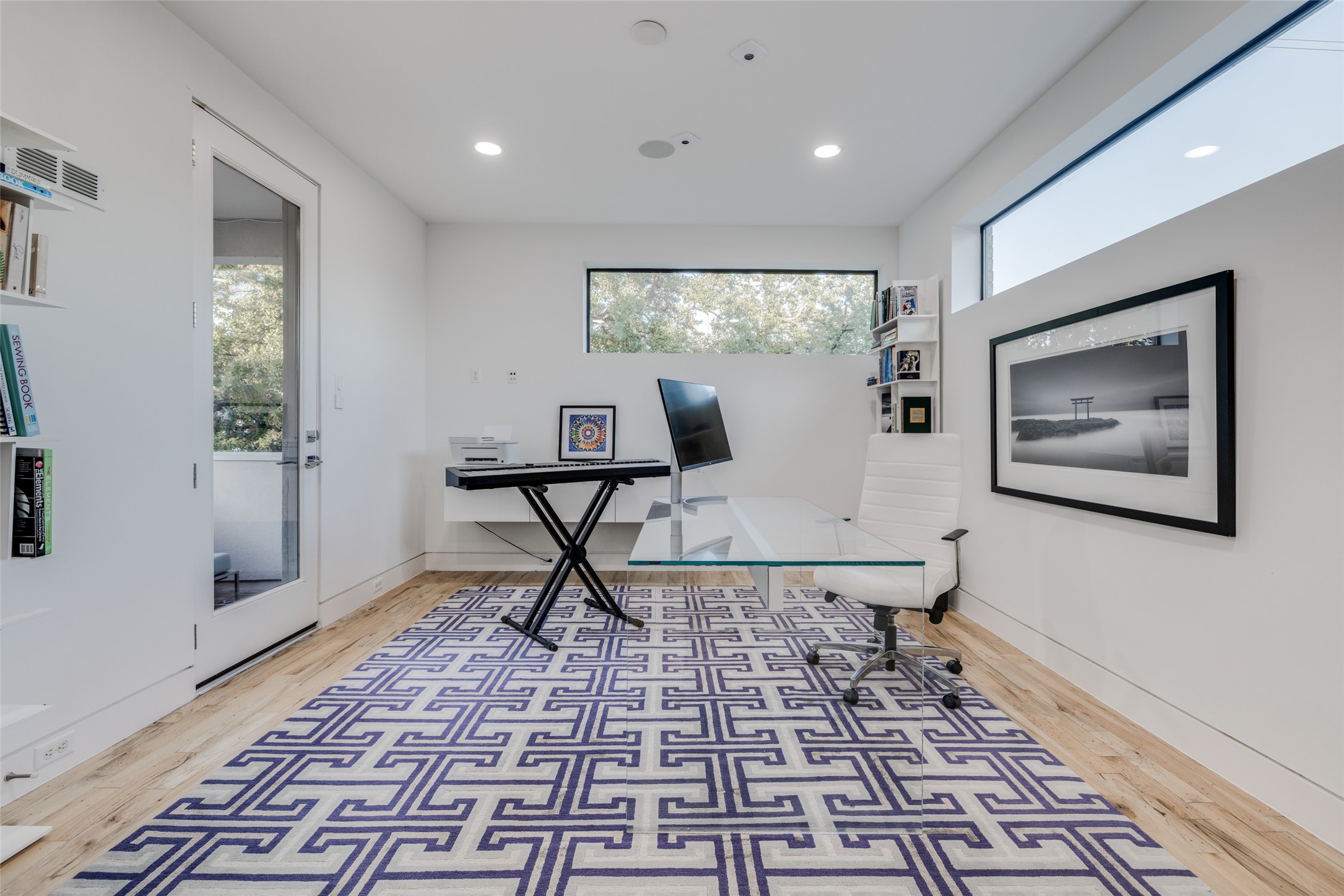 Private study on third floor with lots of natural light, private balcony access & spacious storage closet.