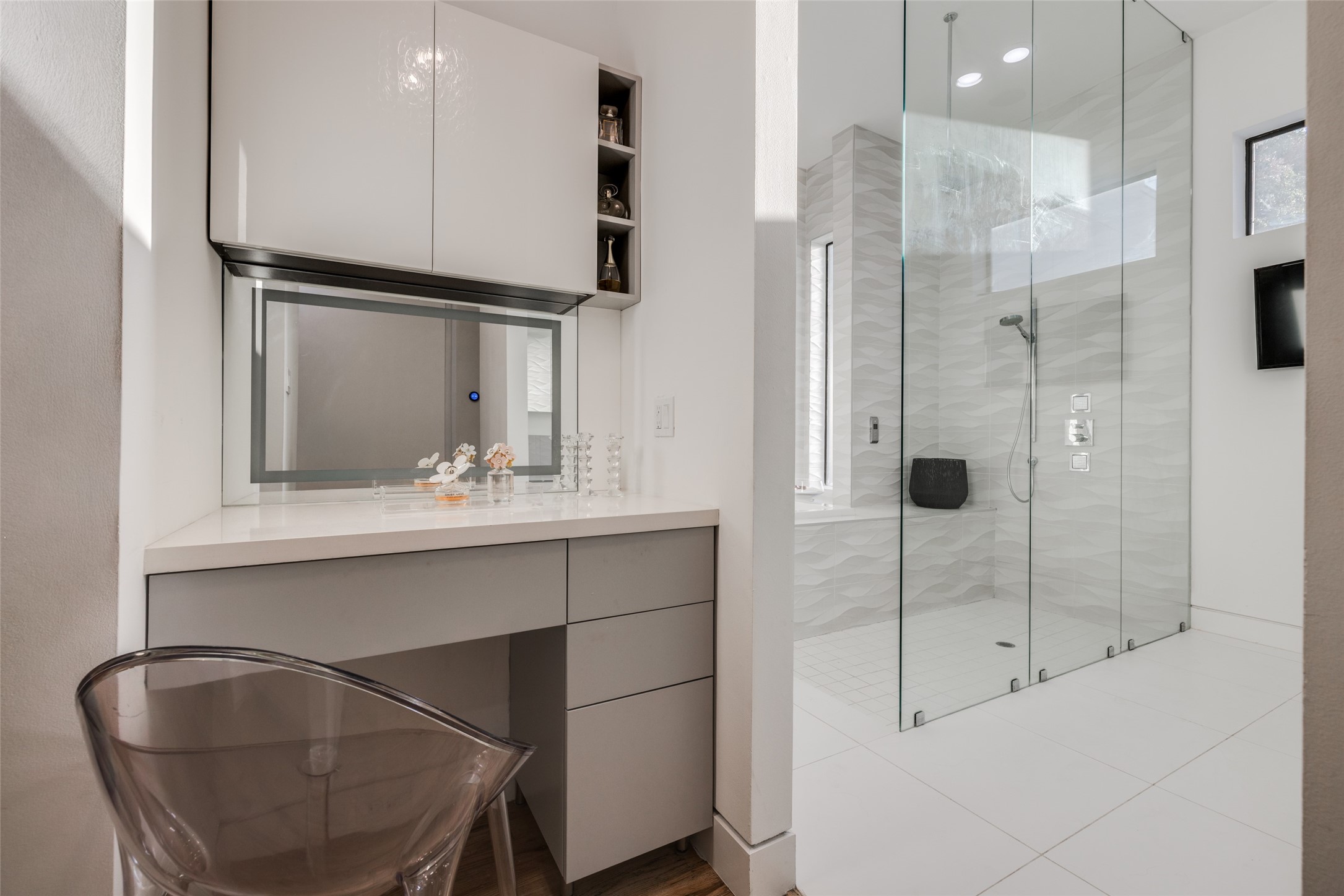 Wonderful Pedini Custom drawers & cabinets - beautiful space for daily make up & hair. House has a Savant Home Automation system.
