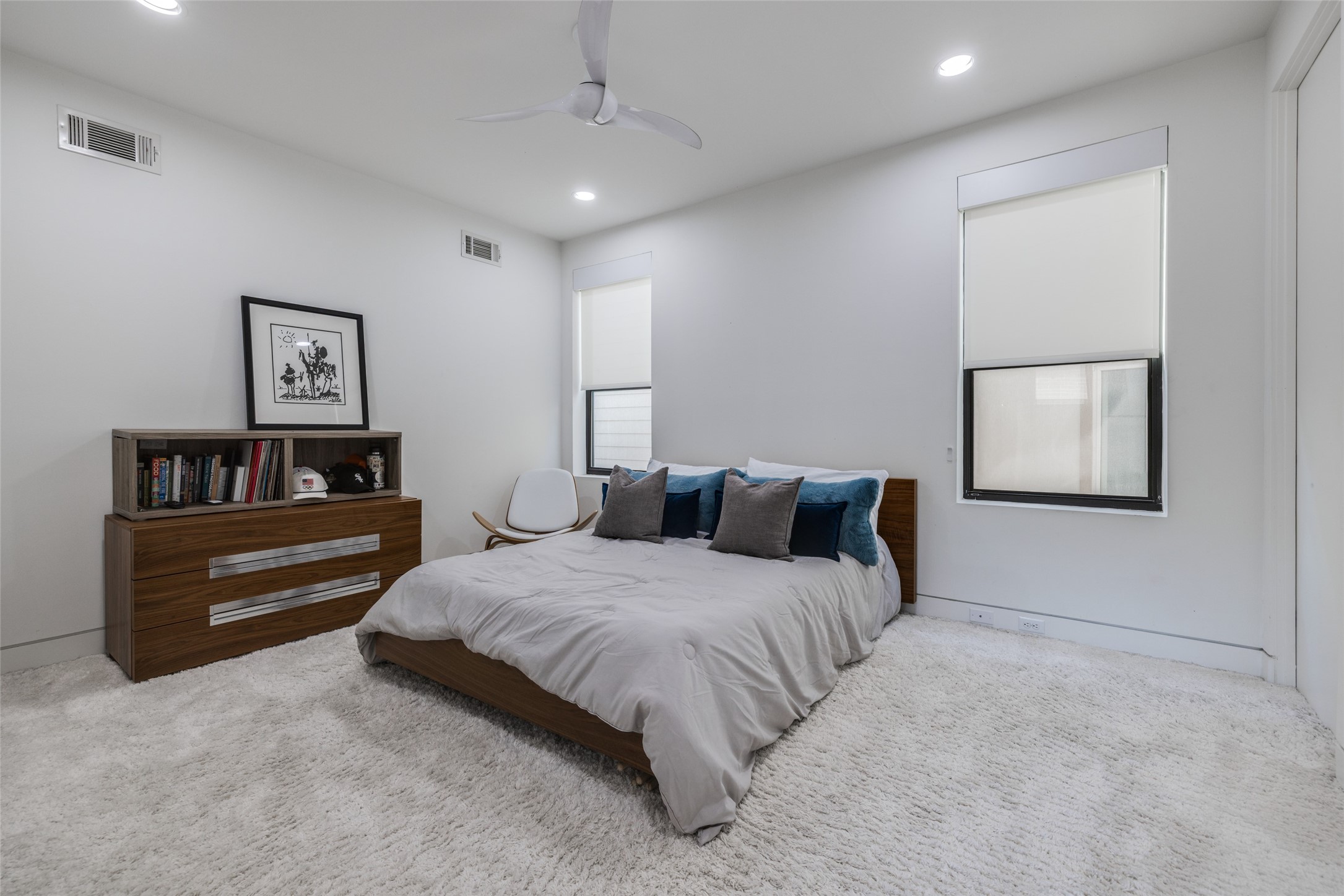 Bedroom 2 - neutral designer carpet, custom designer blinds - dual - privacy & blackout for sleeping, closet with dual levels for hanging, LED lighting, Minka Aire ceiling fan