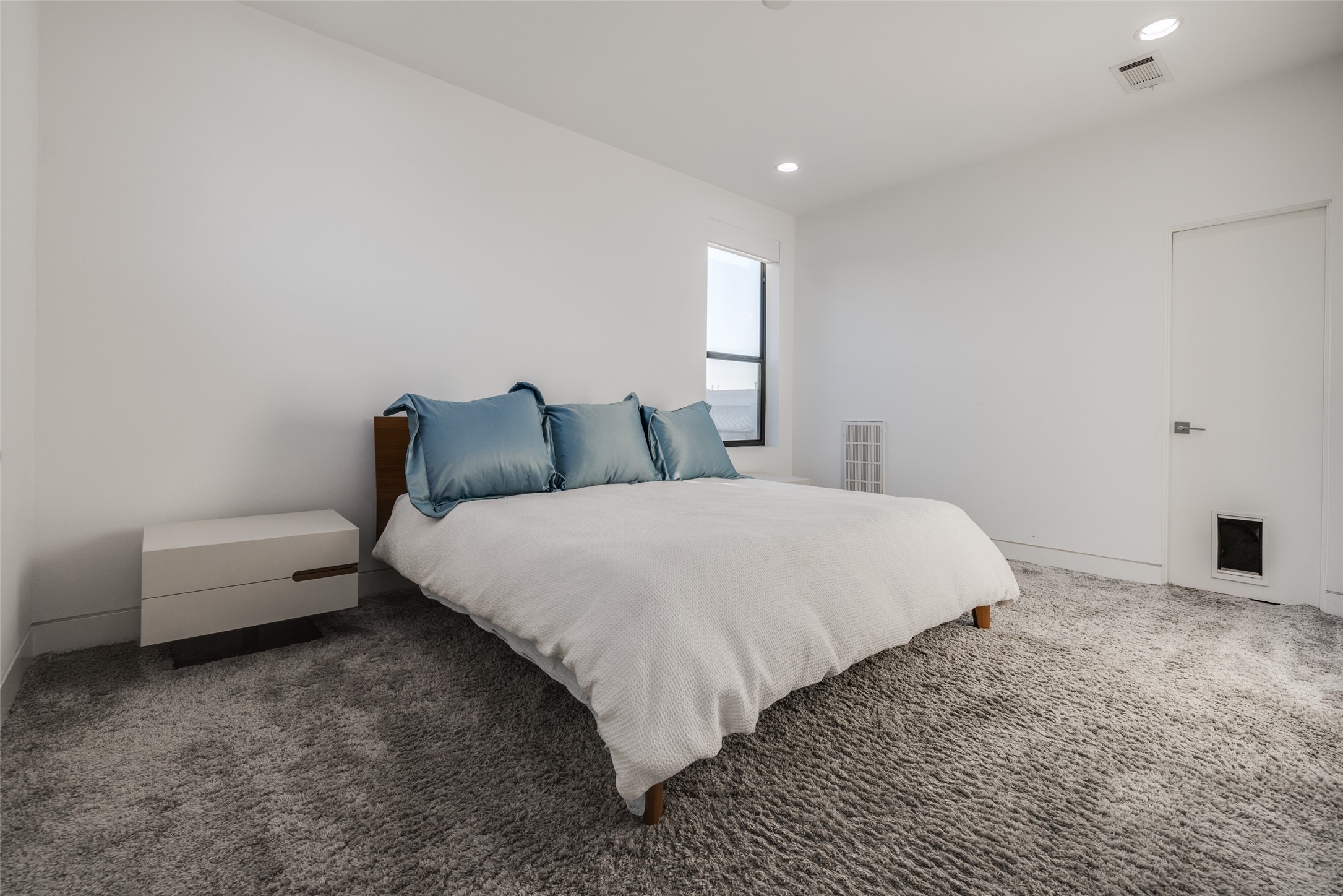 Bedroom 4 with designer carpet, walk in closet