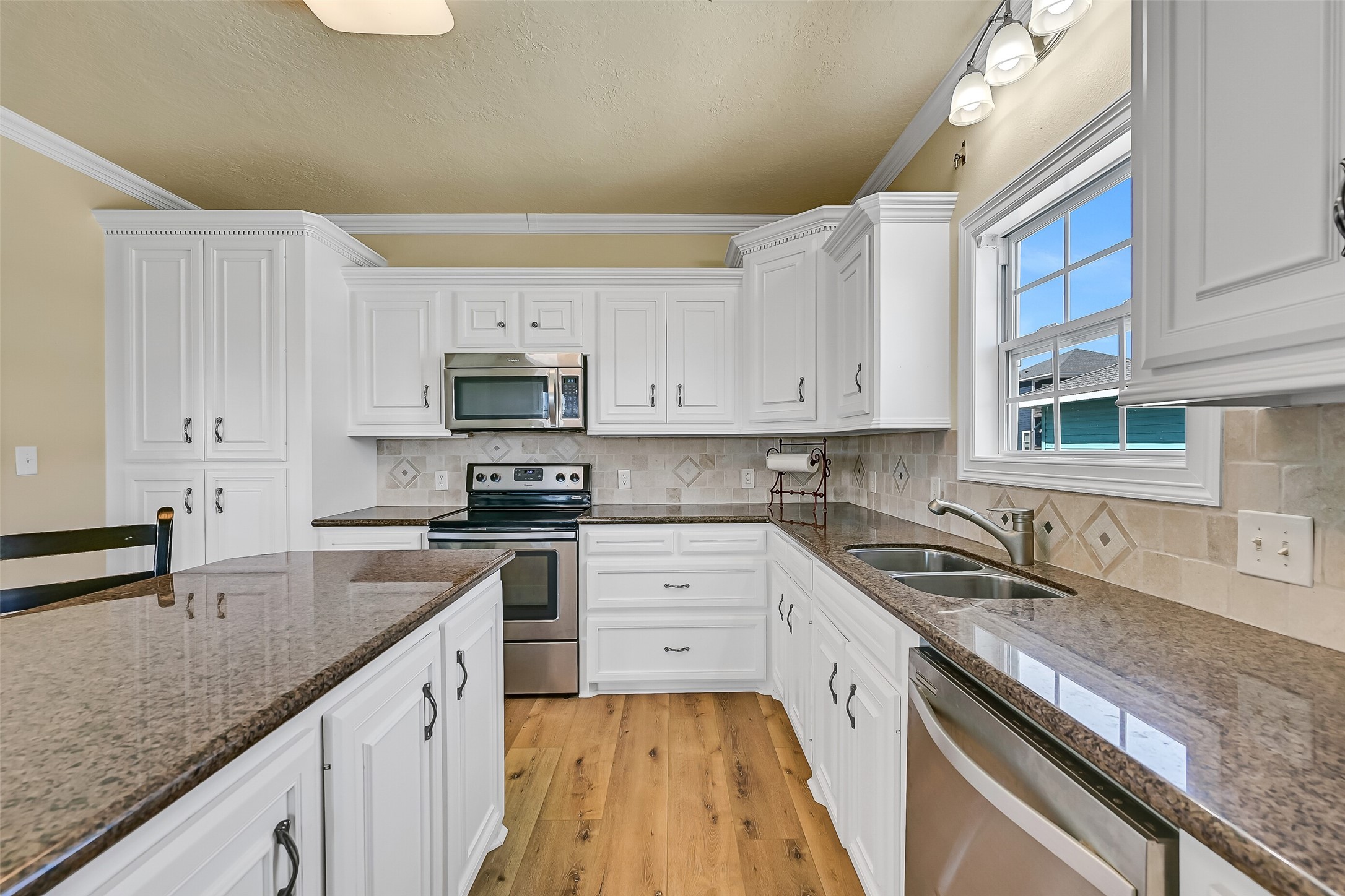Notice the abundant cabinetry throughout.