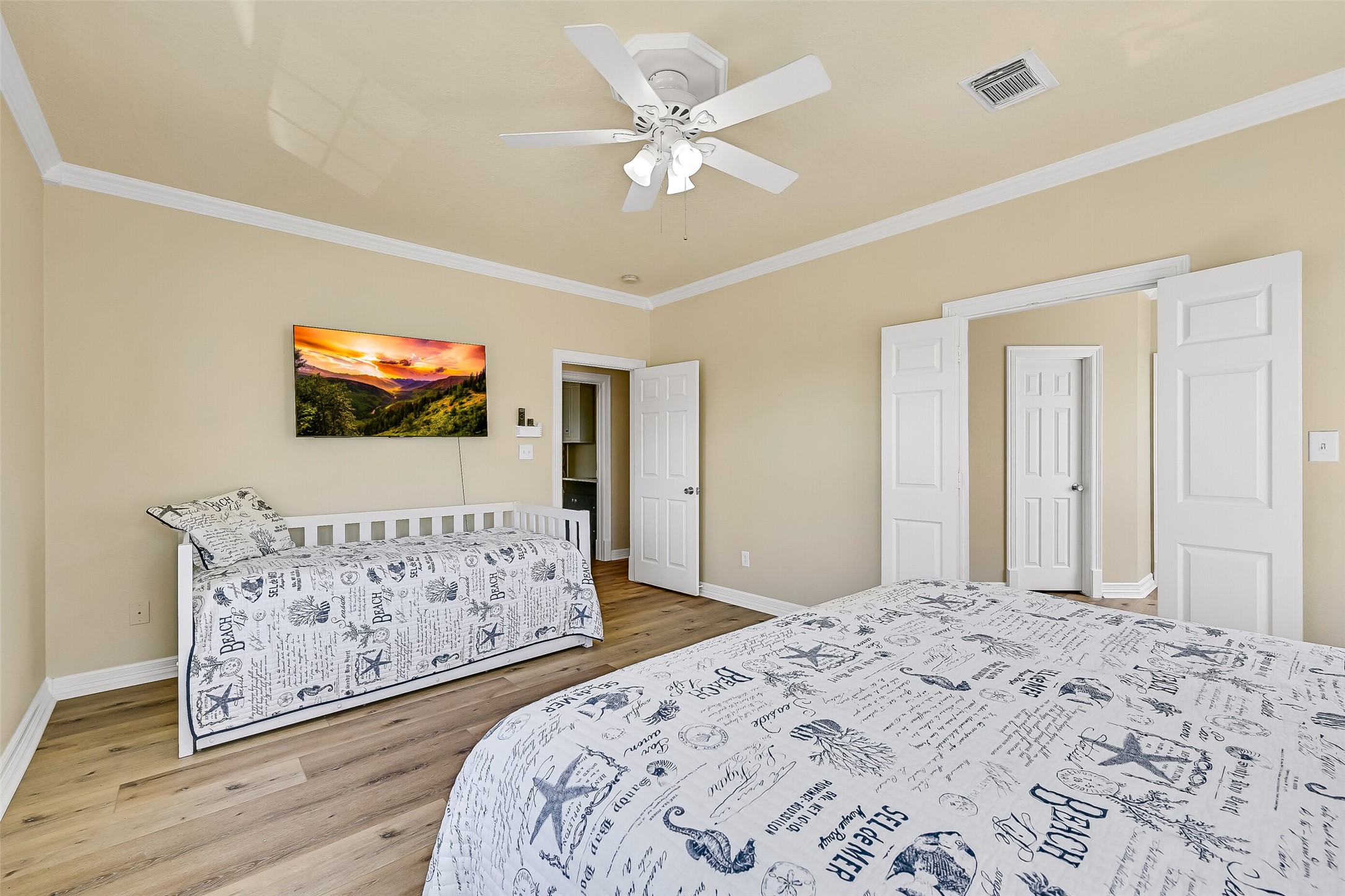 Another view of the primary bedroom.