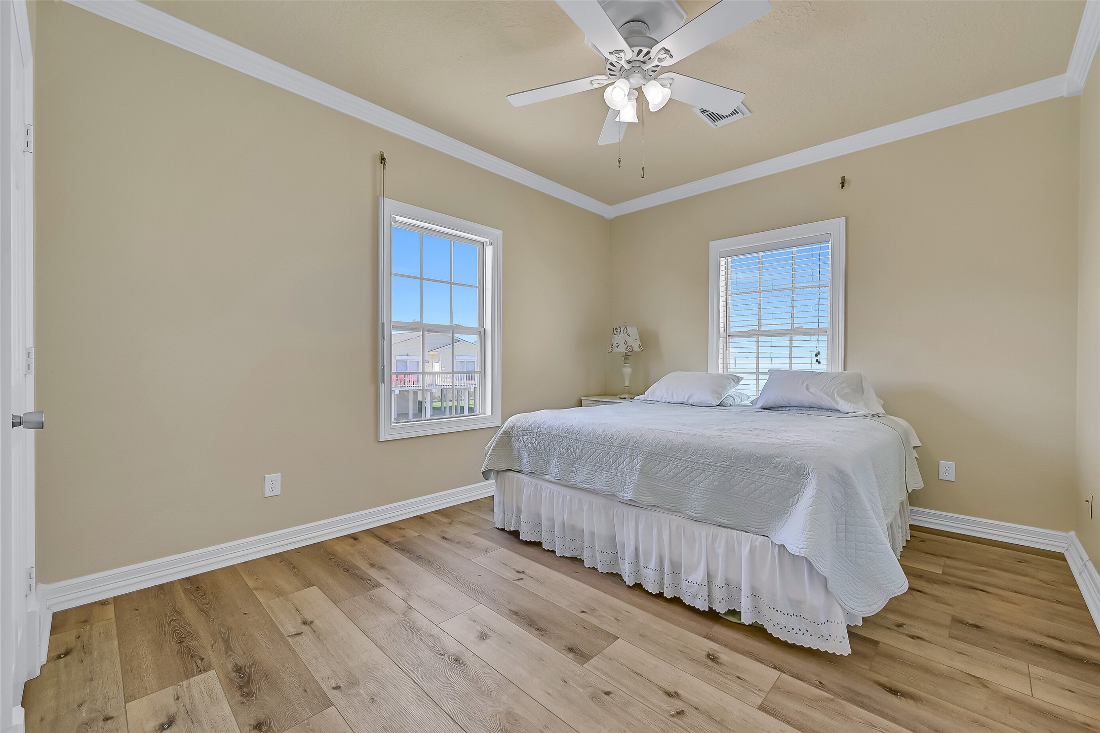 Down the hall you will find the second guest bedroom that currently hosts a king bed.