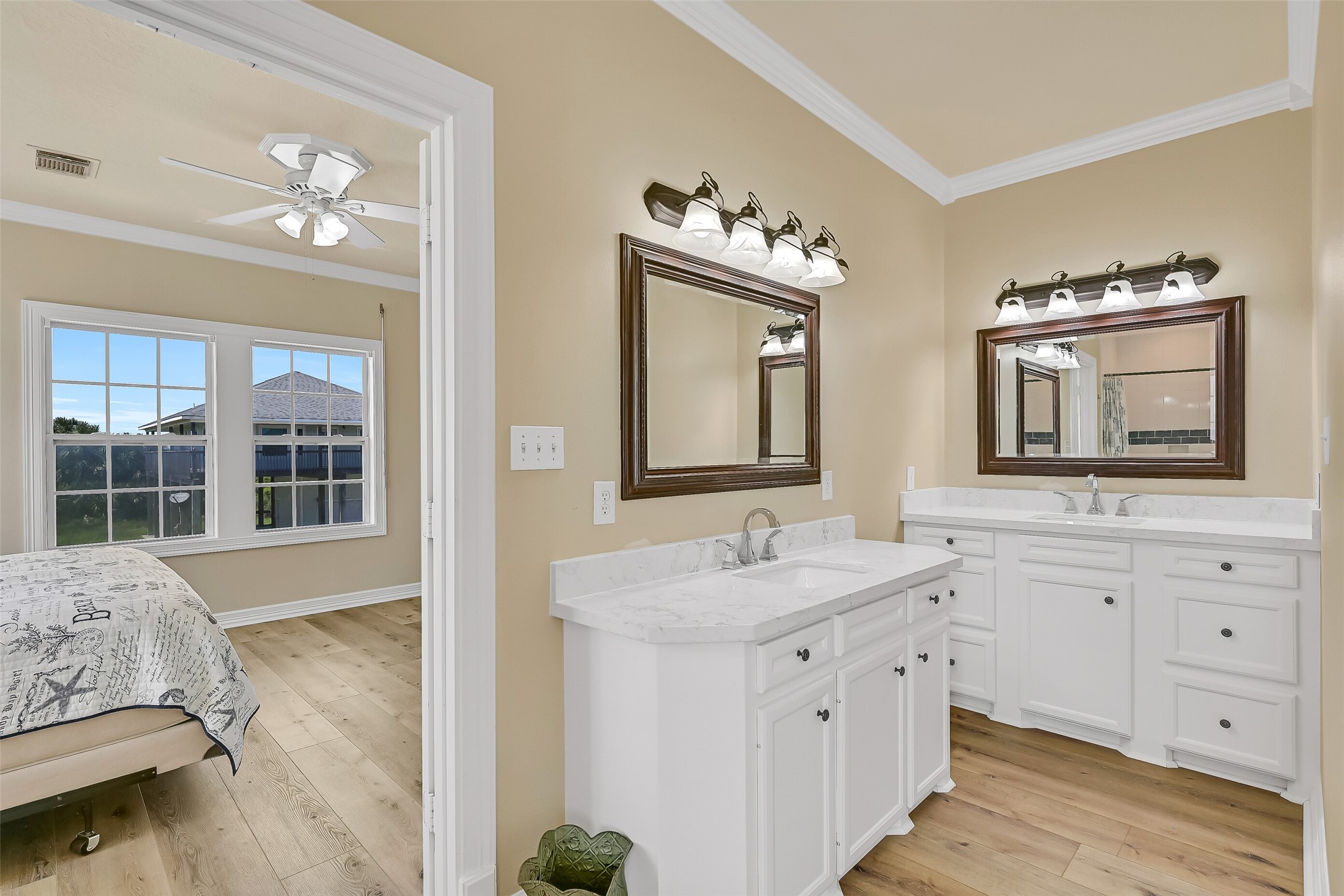 The bathroom has plenty of storage and cabinet space.