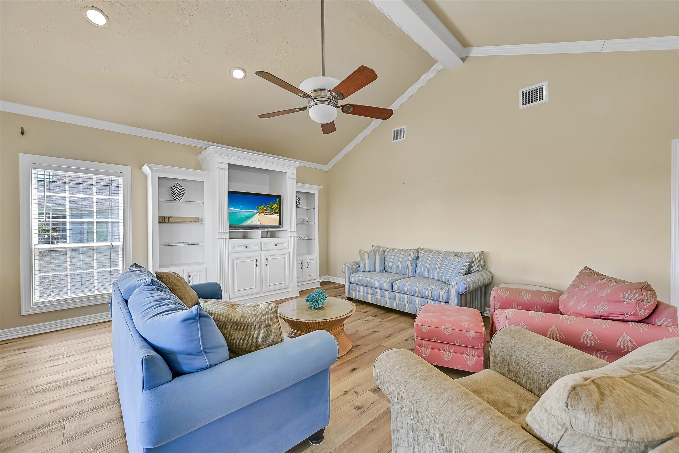 As you enter you will be welcomed into the spacious open living room.