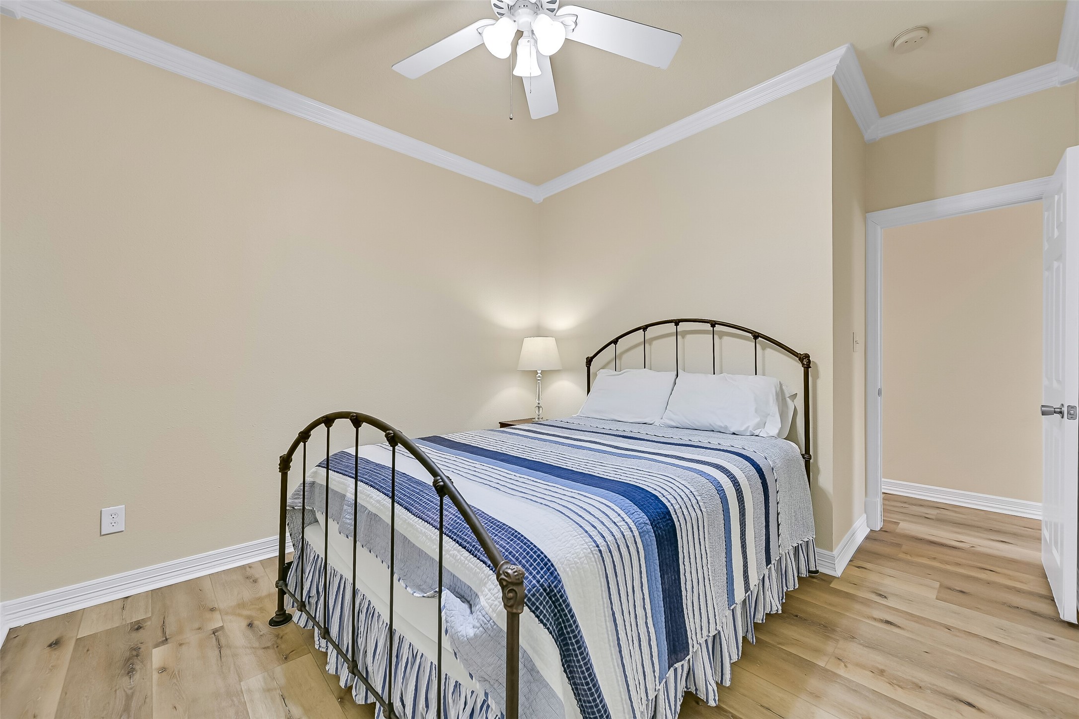 The first of two spacious guest bedrooms you will come across.