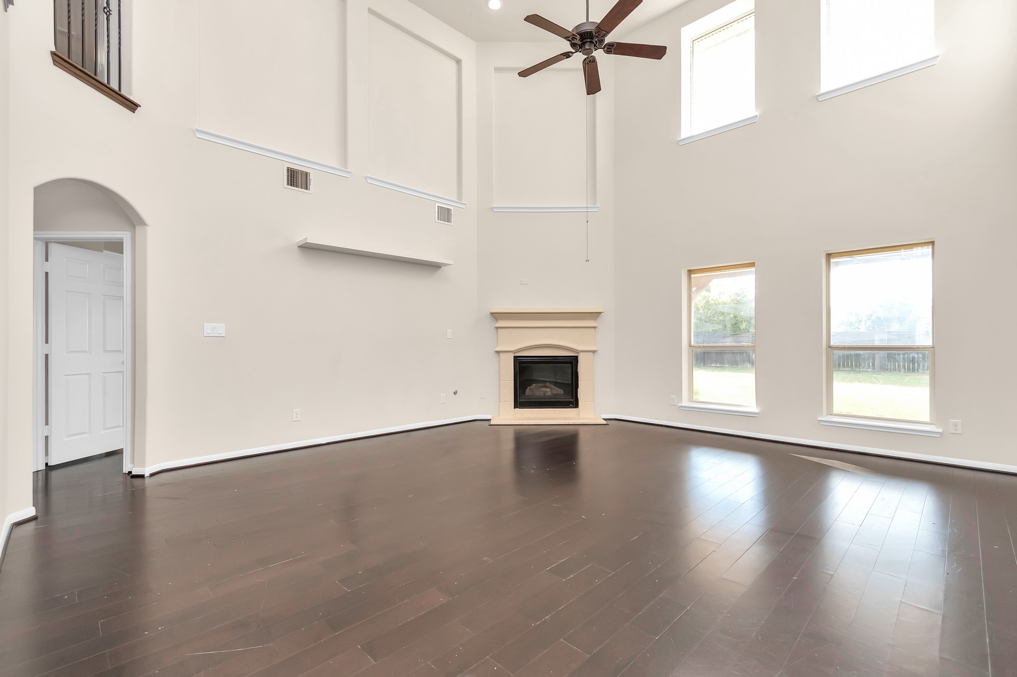 Living room with abundant natural light. High ceilings