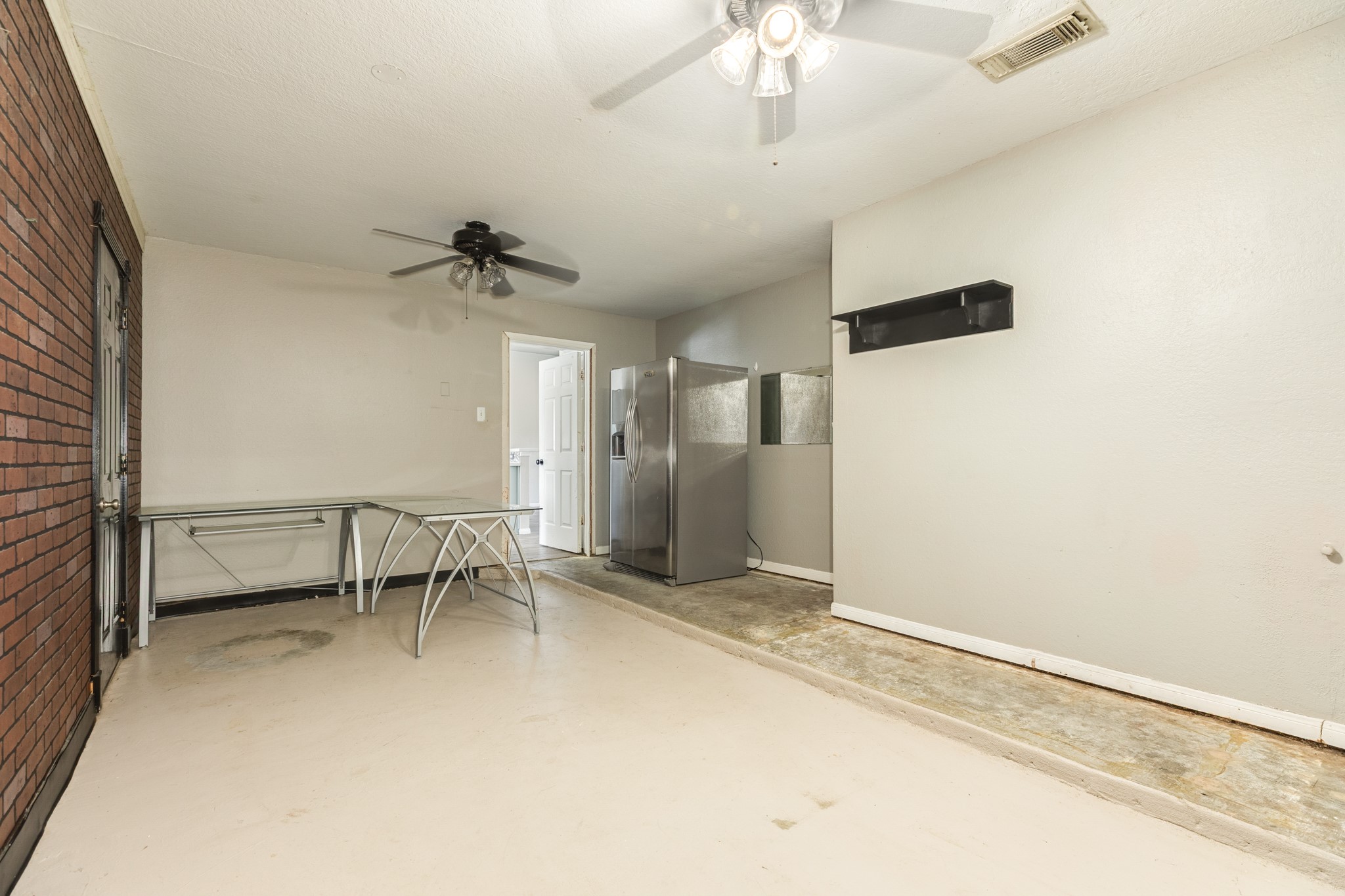 Enclosed garage was used for 4th bedroom and home office.