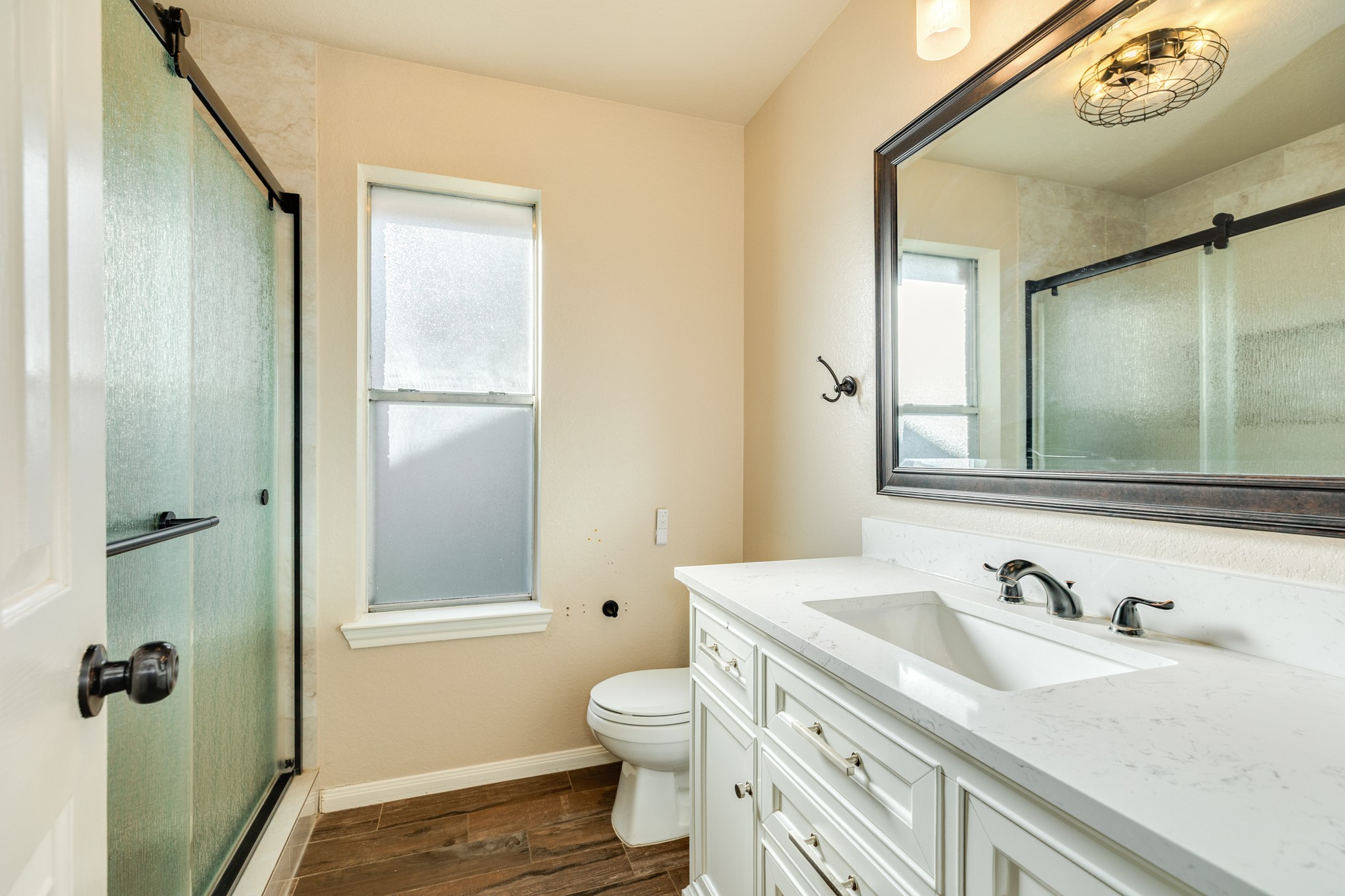 Updated secondary bathroom with tub shower combo.