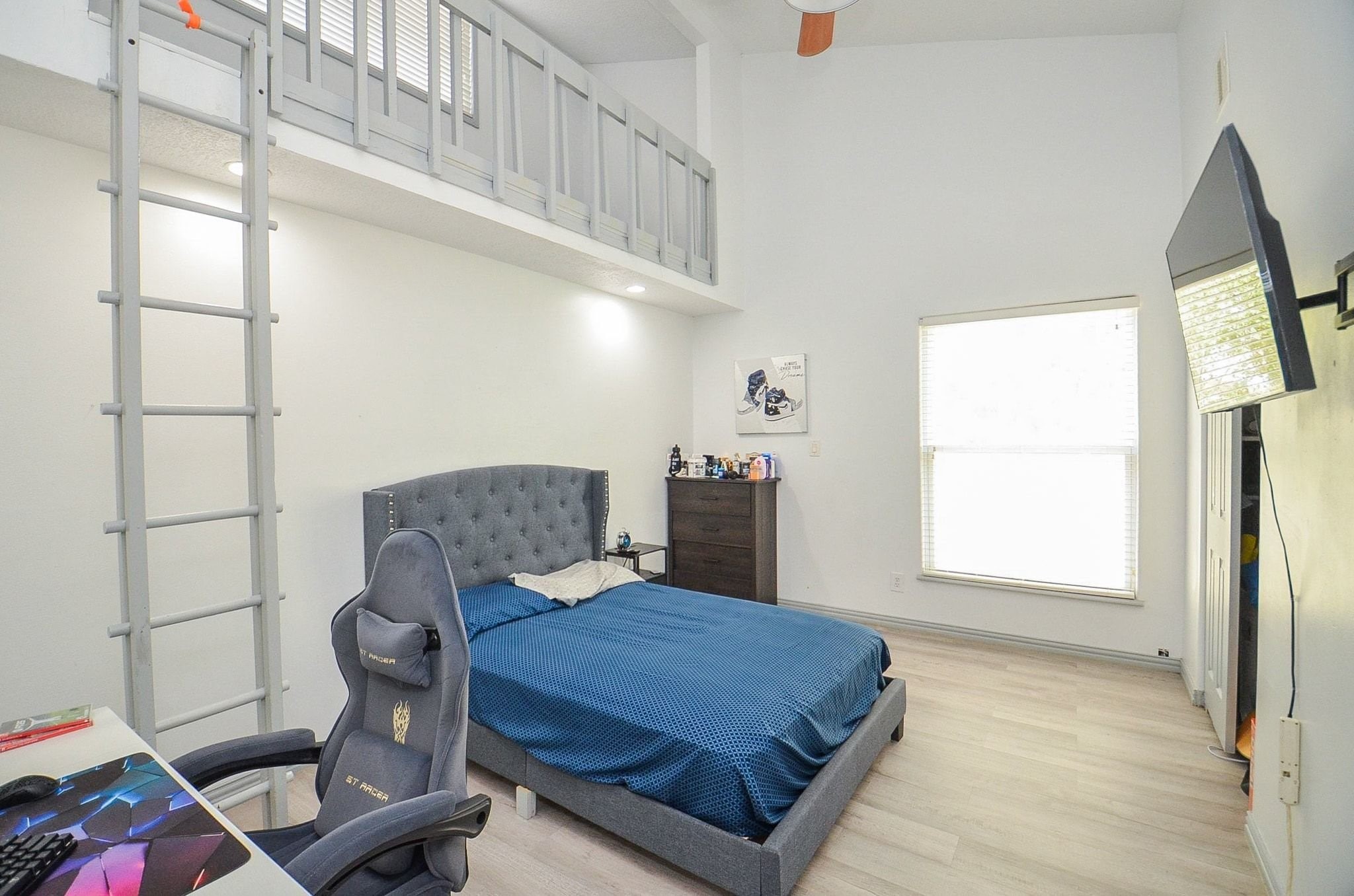 Discover this next bedroom with loft features. This room has the beautiful wood-look flooring, and spacious closet.