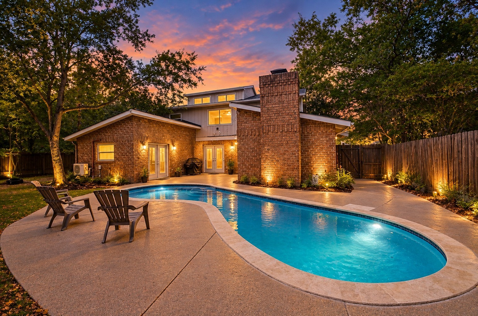 Backyard pool at twilightvirtual dusk edit; actual lighting may vary.