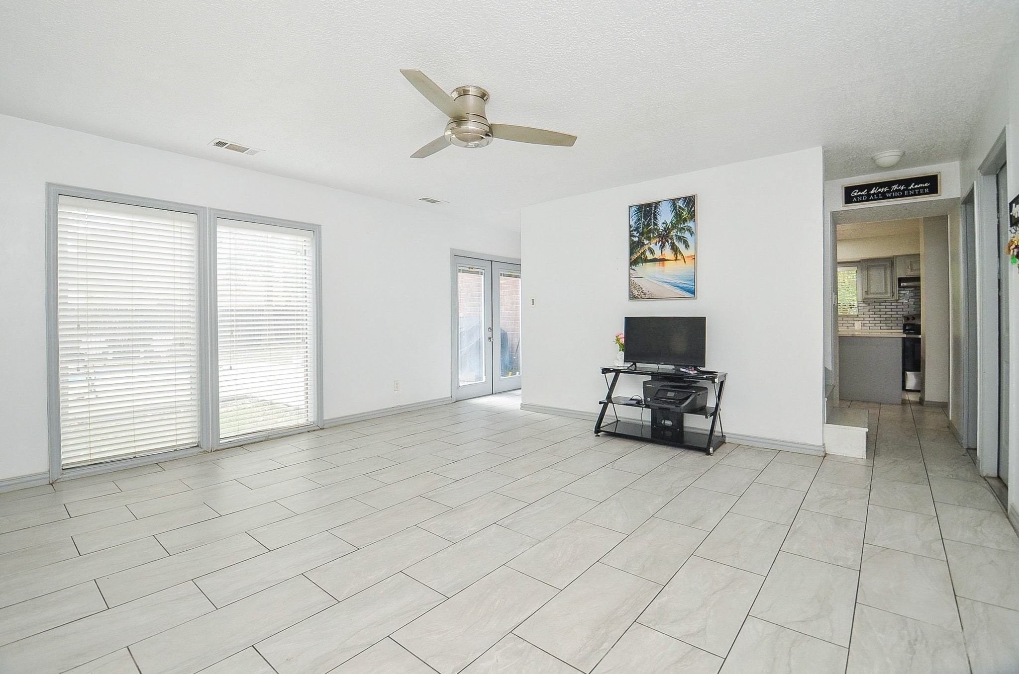 Discover this beautiful and spacious living space. Bright and open area features low maintenance flooring, huge windows, and plenty of space for your decorative inspirations.