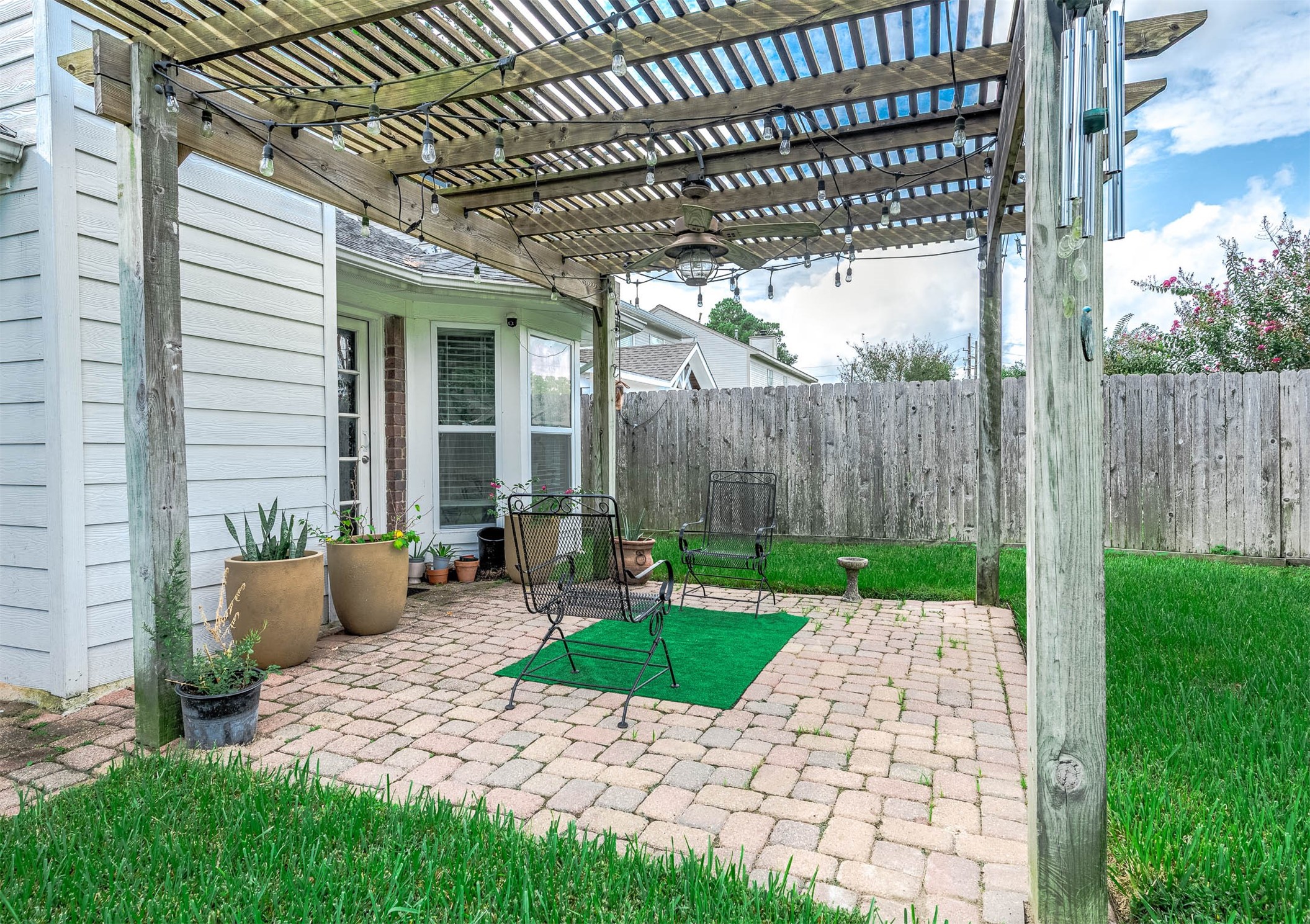 Come and see this spacious
backyard with a beautiful patio!