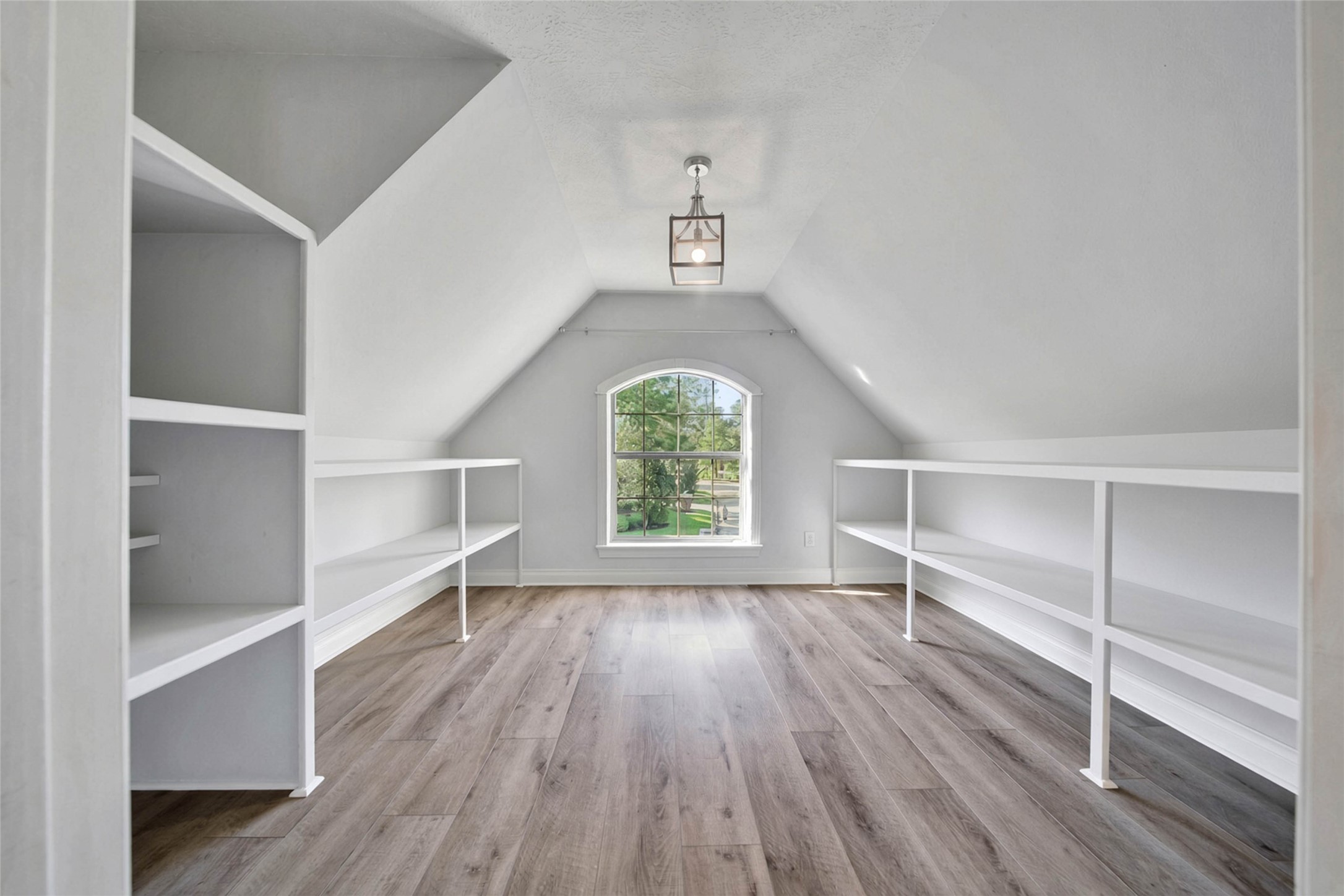 Versatile finished space perfect for a yoga studio, gaming hub, or any creative endeavor.