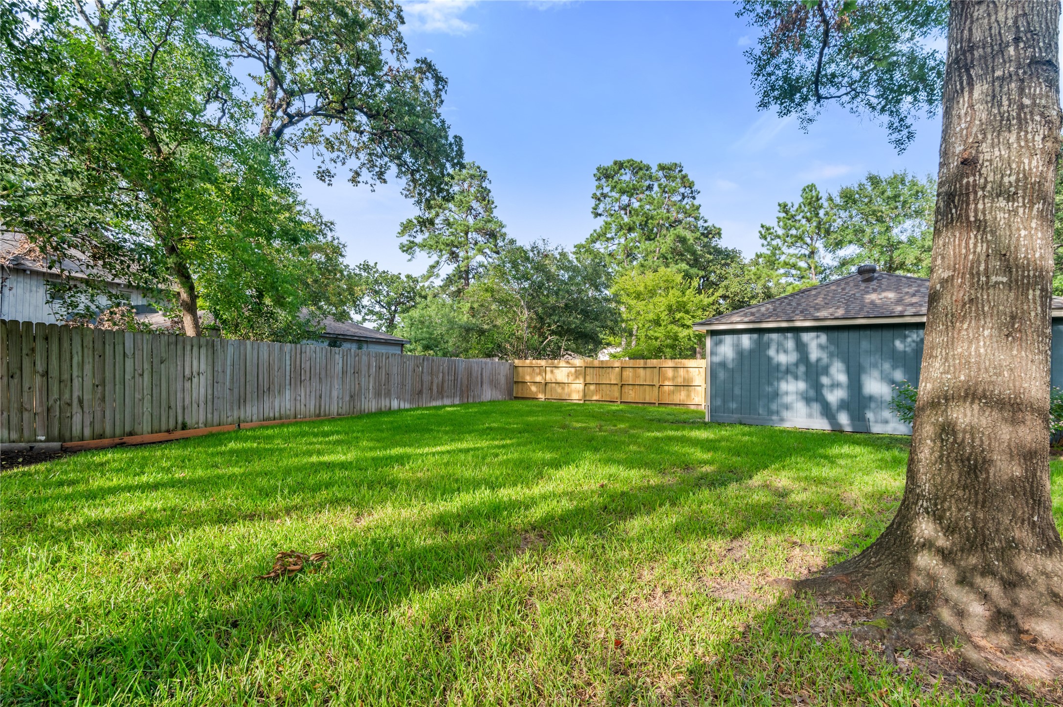 Backyard looking toward garage