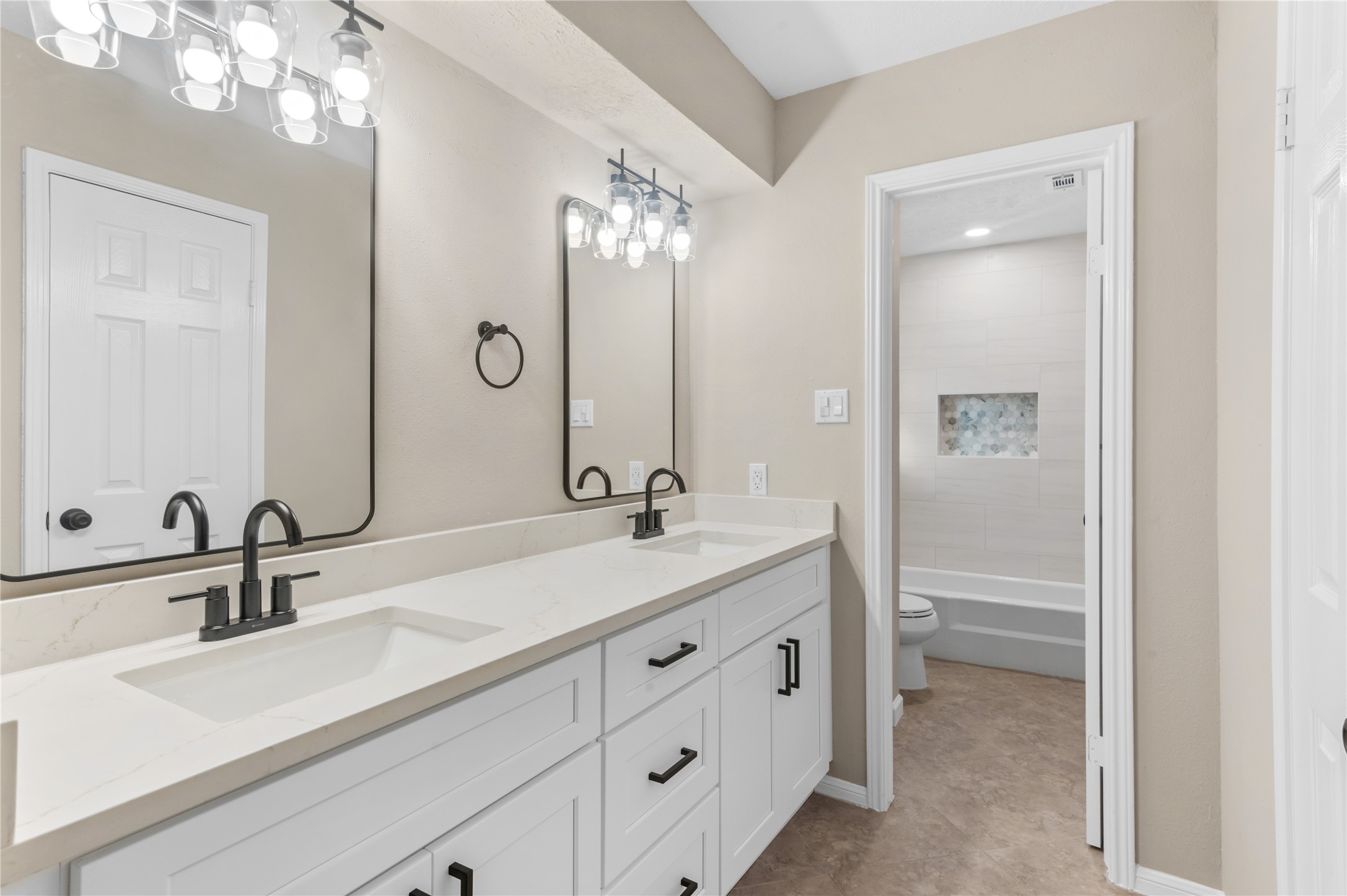 Updated master bathroom with double sinks! Updated master bathroom with double sinks!
