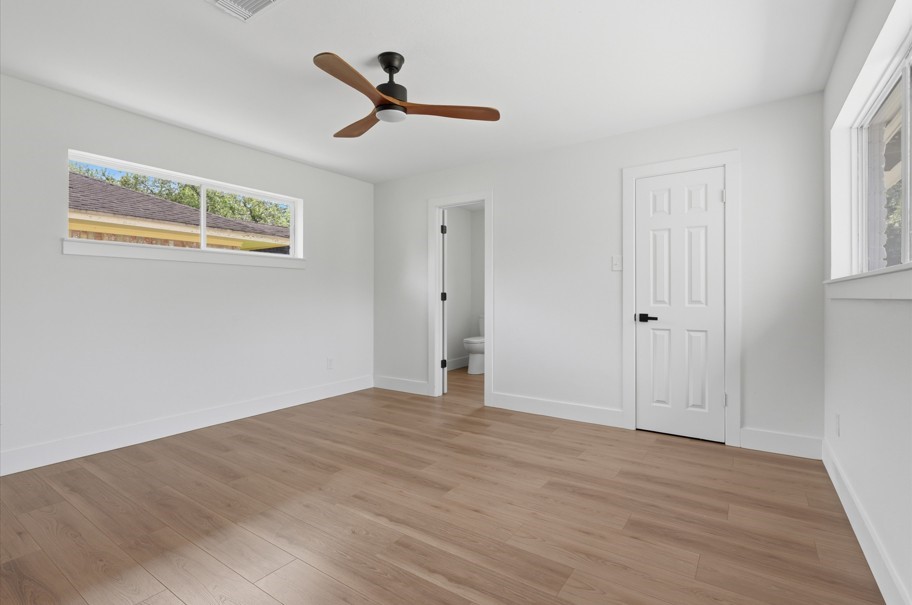 The primary bedroom is thoughtfully separated from the secondary bedrooms, creating a private retreat for added comfort. Featuring abundant natural light, peaceful backyard views, and thoughtful updates throughout, this space offers a relaxing environment designed for peace of mind.
