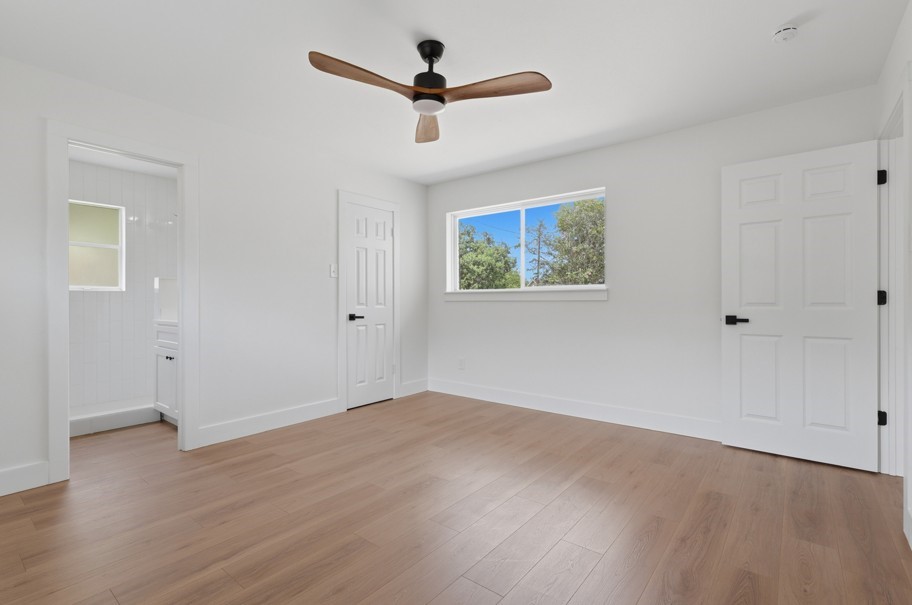 The primary bedroom is thoughtfully separated from the secondary bedrooms, creating a private retreat for added comfort. Featuring abundant natural light, peaceful backyard views, and thoughtful updates throughout, this space offers a relaxing environment designed for peace of mind.